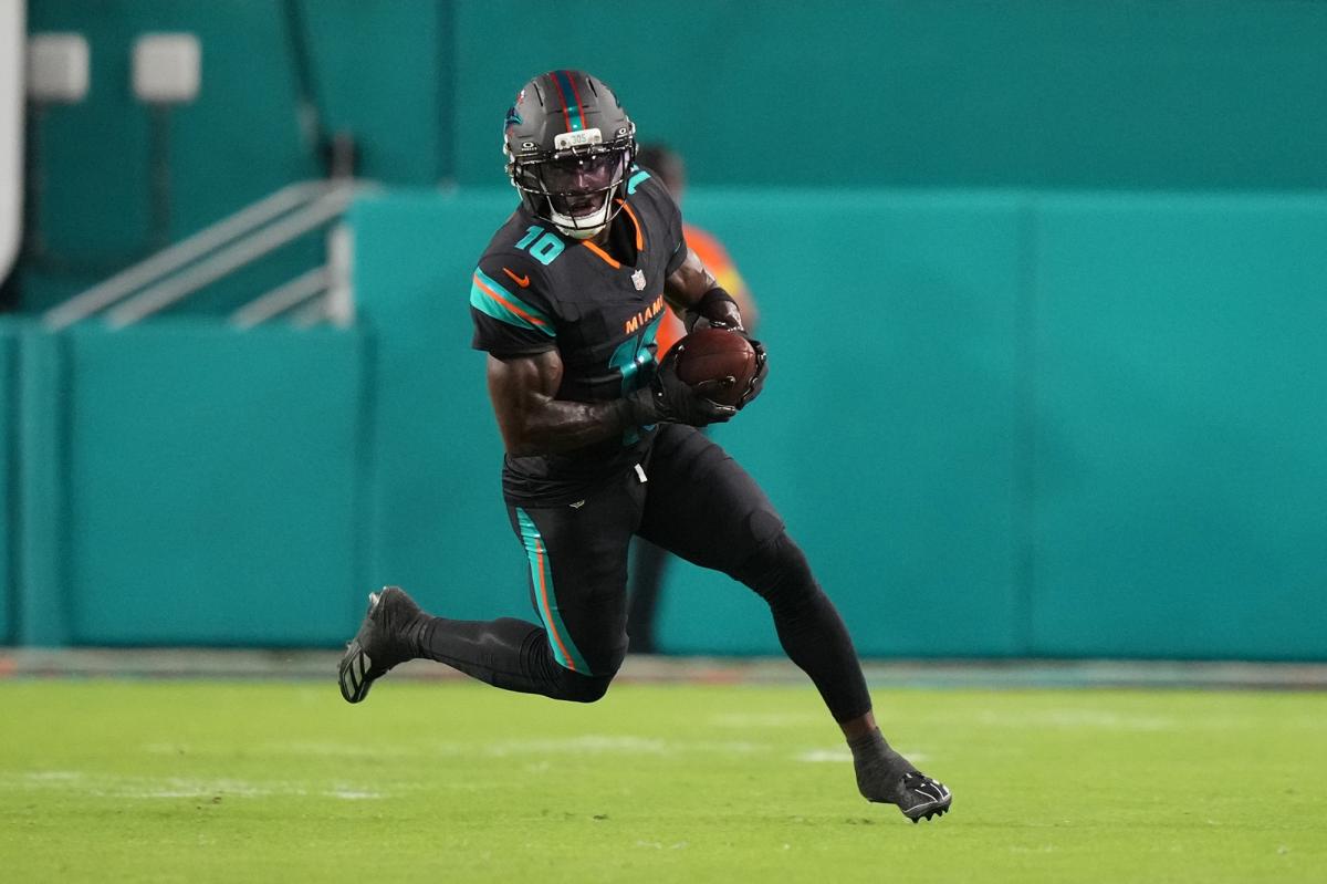 Tyreek Hill promises comeback after Dolphins cut
