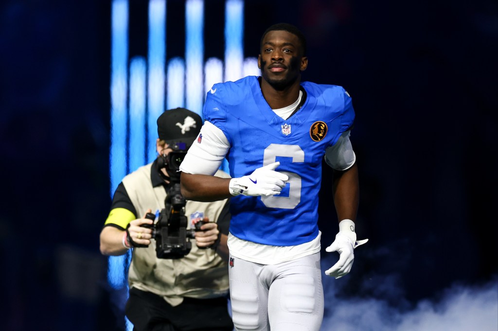 Terrion Arnold #6 of the Detroit Lions runs onto the field prior to an NFL football game against the Green Bay Packers at Ford Field on November 27, 2025 in Detroit, Michigan.
