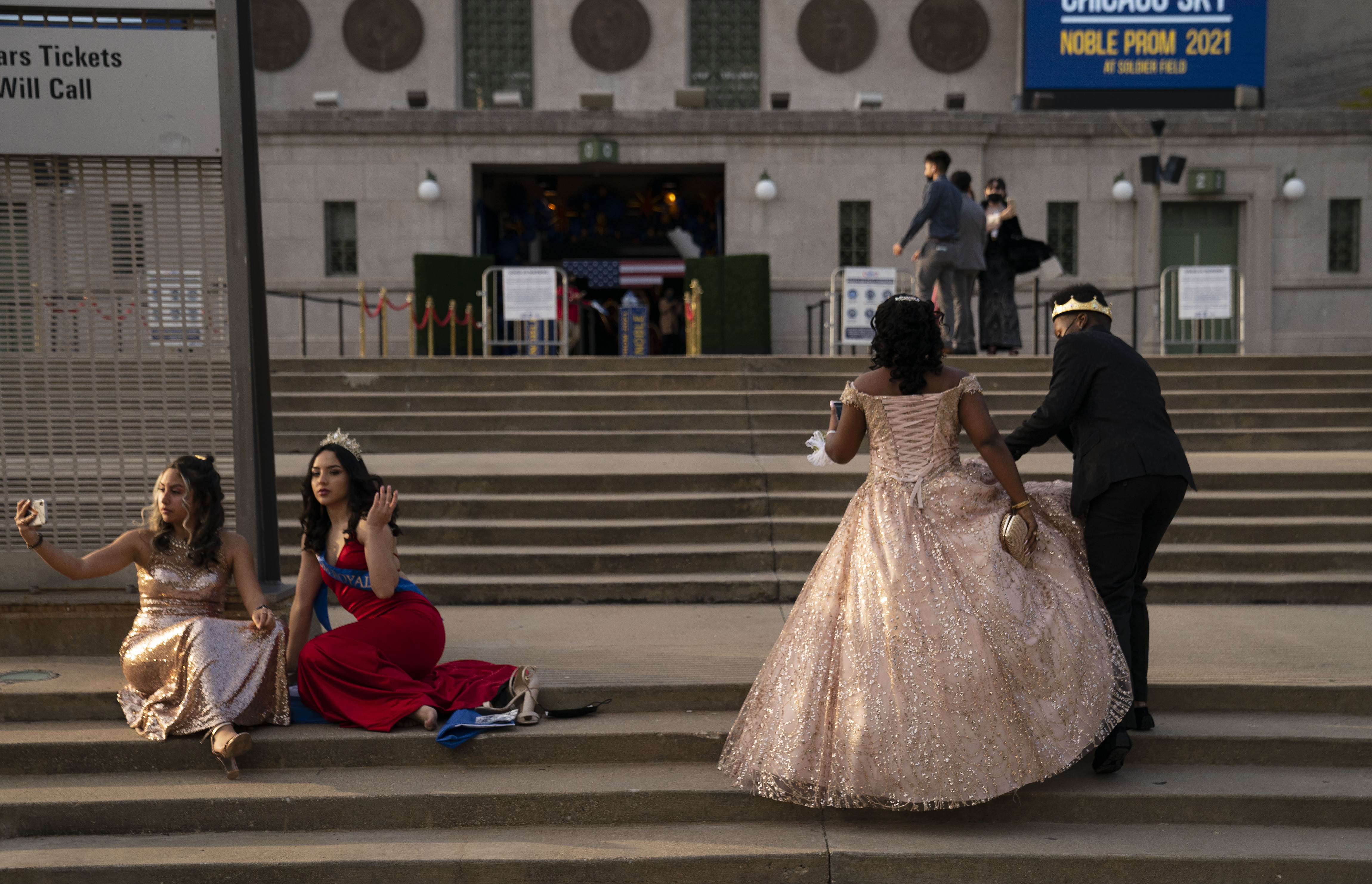 Jamari Clay escorts his sister Jaylen Clay to the Noble...