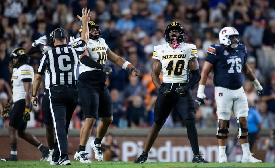 Missouri Tigers linebacker Josiah Trotter (40) celebrates a defensive stop as Auburn Tigers take on Missouri Tigers at Jordan-Hare Stadium in Auburn, Ala. on Saturday, Oct. 18, 2025. Missouri Tigers defeated the Auburn Tigers 23-17 in 2OT.© Jake Crandall&sol; Advertiser &sol; USA TODAY NETWORK via Imagn Images