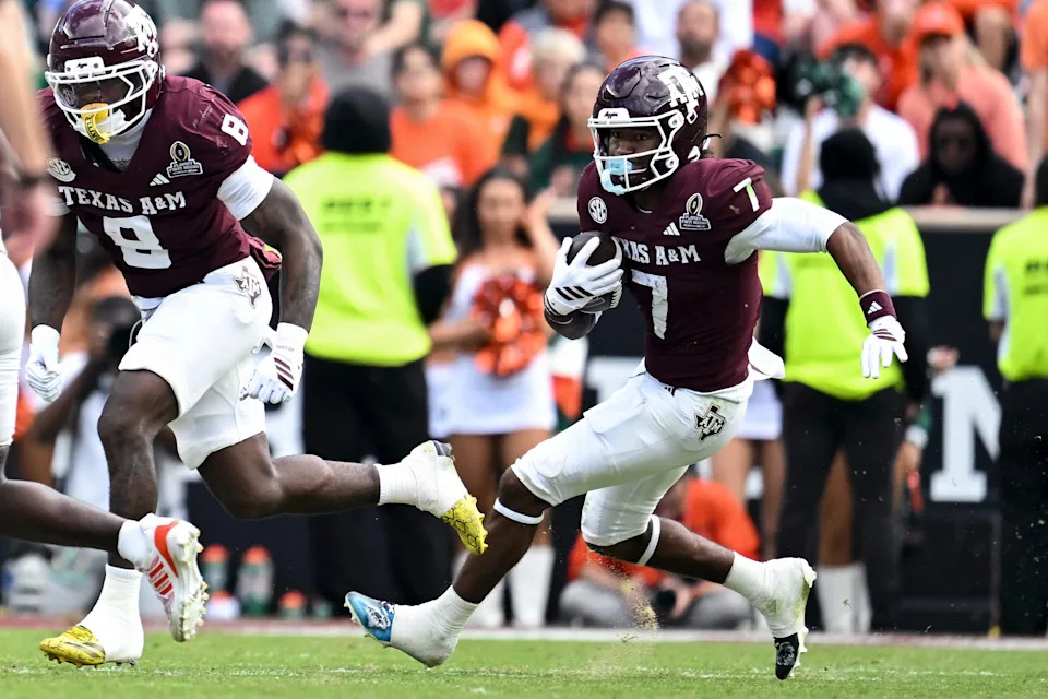 Dec 20, 2025; College Station, TX, USA; Texas A&M Aggies wide receiver KC Concepcion (7) runs the ball against the Miami Hurricanes during the second half at Kyle Field. Mandatory Credit: Maria Lysaker-Imagn Images