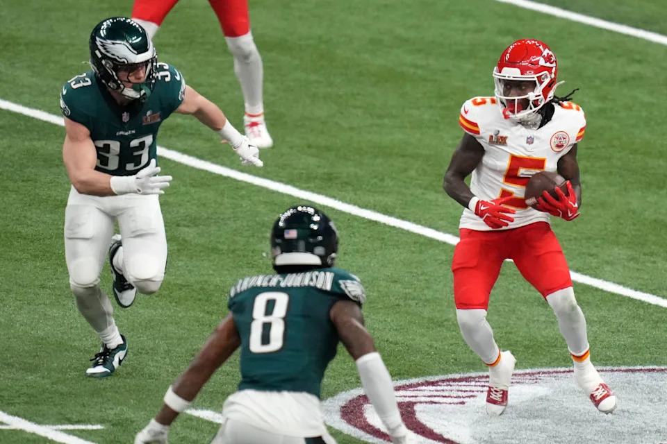 Feb 9, 2025; New Orleans, LA, USA; Kansas City Chiefs wide receiver Hollywood Brown (5) makes a catch against Philadelphia Eagles cornerback Cooper DeJean (33) during the second quarter in Super Bowl LIX at Caesars Superdome. Mandatory Credit: Kirby Lee-Imagn Images