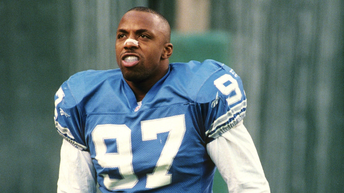 Tracy Scroggins looks on during a game