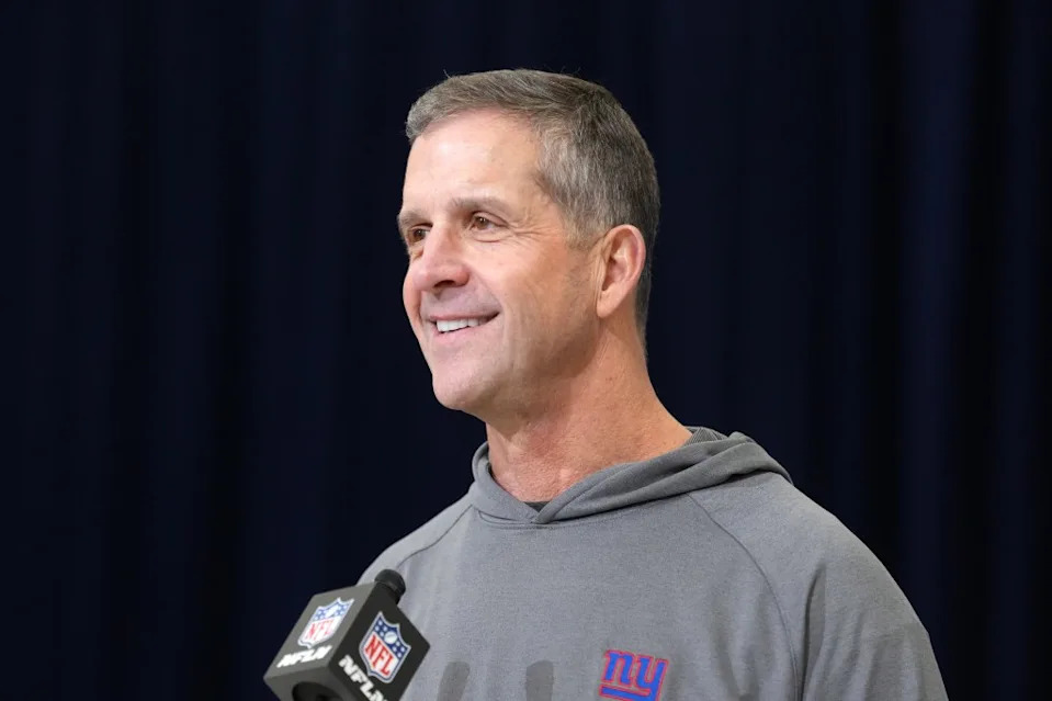 Giants coach John Harbaugh speaks at the NFL Scouting Combine at the Indiana Convention Center. Kirby Lee-Imagn Images