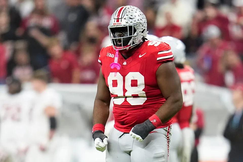 Ohio State Buckeyes defensive tackle Kayden McDonald celebrates during the first half of the Big Ten championship game against the Indiana Hoosiers at Lucas Oil Stadium in Indianapolis on Dec. 6, 2025.