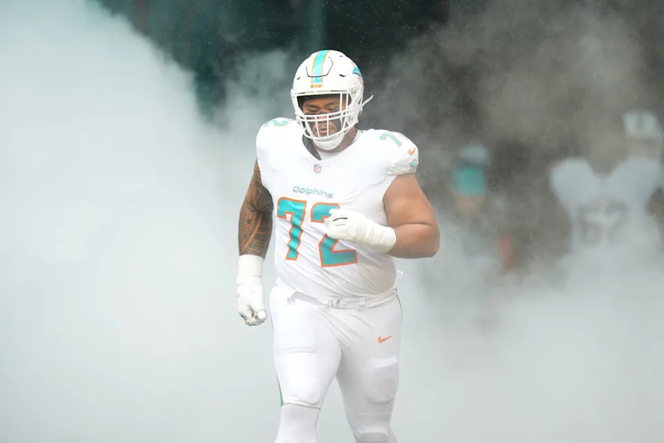 Nov 30, 2025; Miami Gardens, Florida, USA; Miami Dolphins guard Jonah Savaiinaea (72) takes the field prior to a game against the New Orleans Saints at Hard Rock Stadium. Rich Storry-Imagn Images