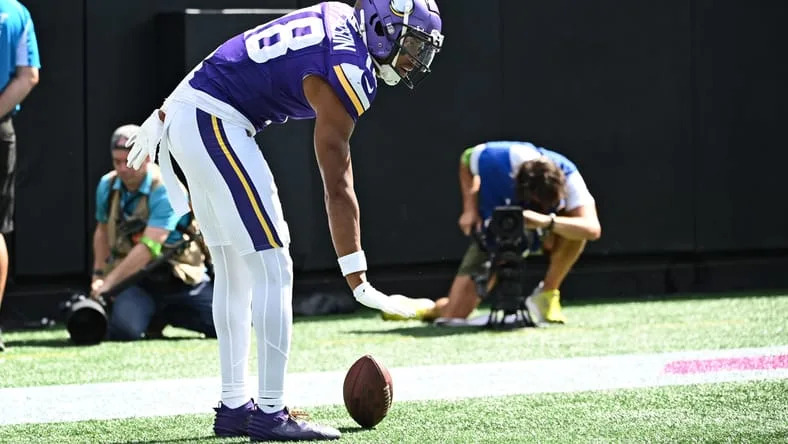 Justin Jefferson reacts after scoring a touchdown for the Vikings.