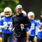 Los Angeles Chargers safeties coach Chris O'Leary runs with the team in 2024.