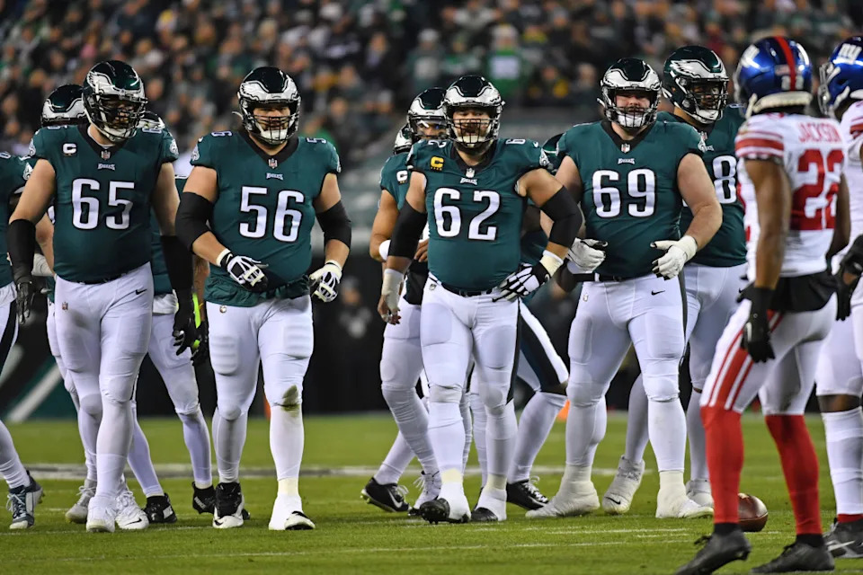 Philadelphia Eagles offensive tackle Lane Johnson (65), guard Isaac Seumalo (56), center Jason Kelce (62) and guard Landon Dickerson (69) prepare for a play against the New York Giants.E