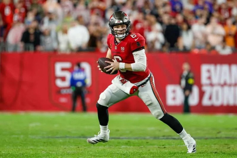 January 3, 2026, Tampa, Florida, USA: Tampa Bay Buccaneers quarterback Baker Mayfield 6 carries the ball, while the Carolina Panthers play defense during the fourth quarter at Raymond James Stadium in Tampa on Saturday, Jan. 3, 2026. Tampa USA – ZUMAs70_ 20260103_zan_s70_123 Copyright: xJeffereexWoox