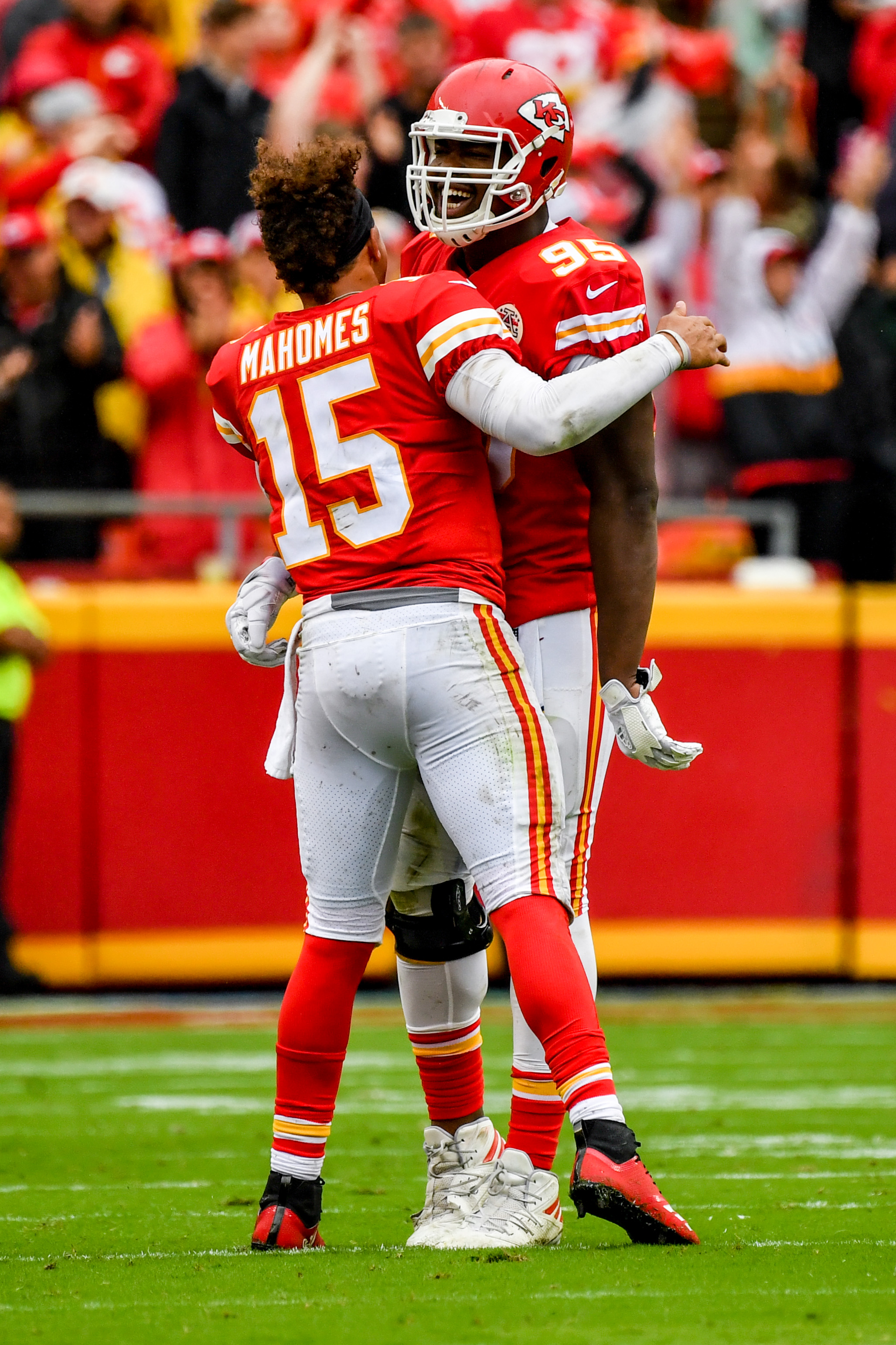 KANSAS CITY, MO - OCTOBER 7: Chris Jones #95 of the Kansas City Chiefs celebrates with teammate Patrick Mahomes #15 after an interception return for a touchdown during the second quarter of the game against the Jacksonville Jaguars at Arrowhead Stadium on October 7, 2018 in Kansas City, Missouri. (Photo by Peter Aiken/Getty Images)