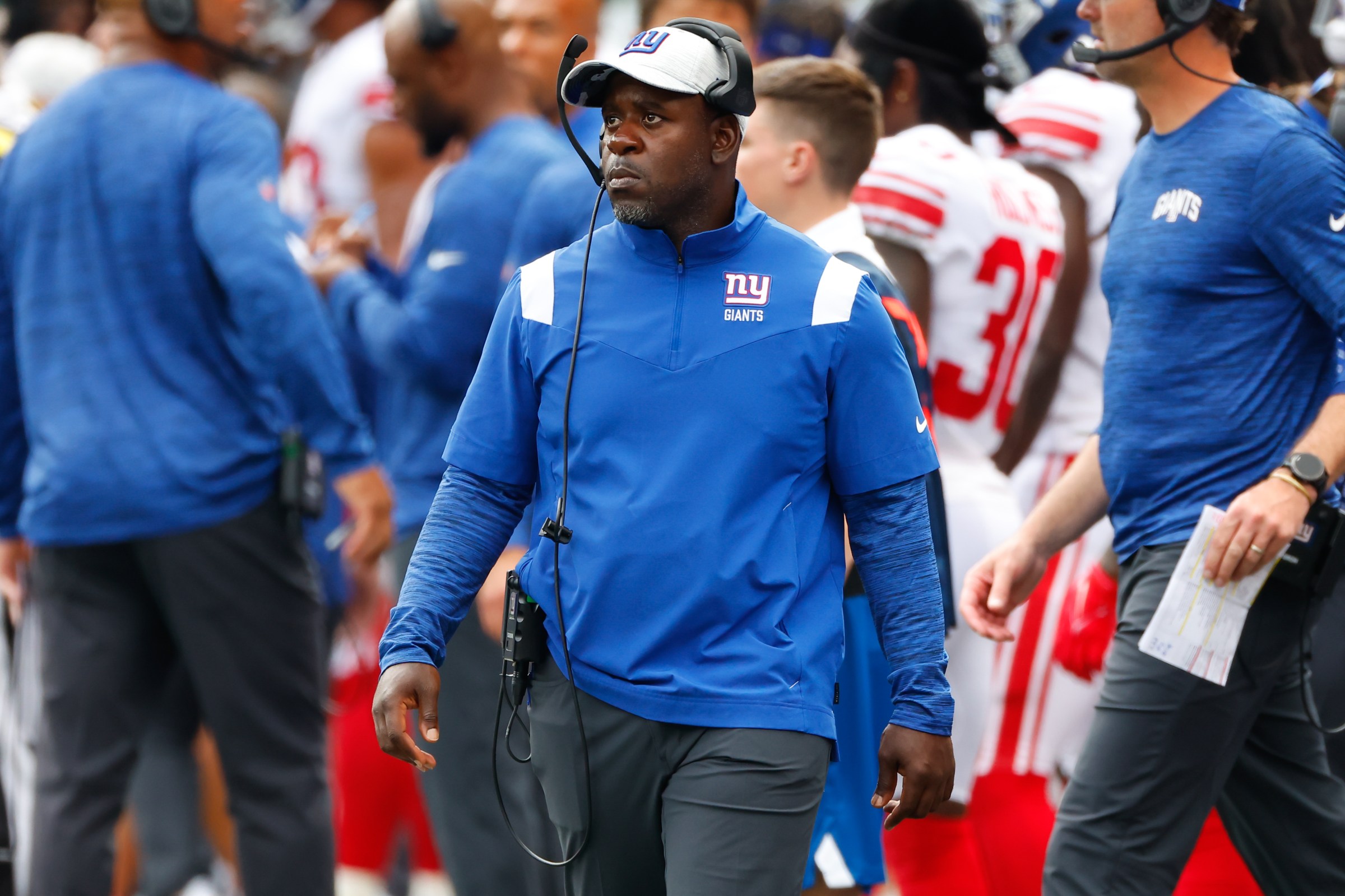 EAST RUTHERFORD, NJ - AUGUST 28: New York Giants offensive line coach John Egorugwu during the second quarter of the National Football League game between the New York Jets and the New York Giants on August 28, 2022 at MetLife Stadium in East Rutherford, New Jersey. (Photo by Rich Graessle/Icon Sportswire via Getty Images)