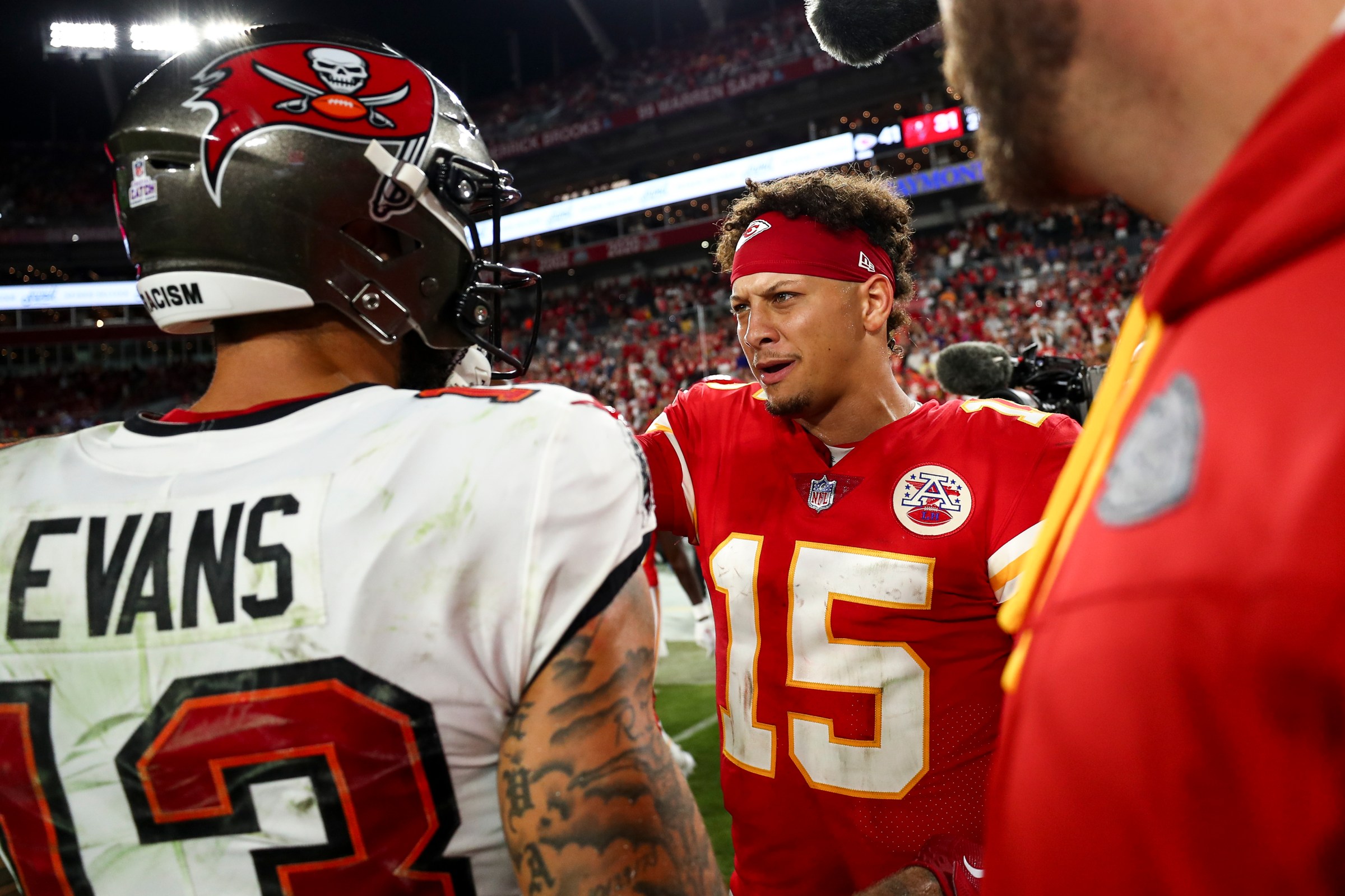 TAMPA, FL - OCTOBER 2: Patrick Mahomes #15 of the Kansas City Chiefs talks with Mike Evans #13 of the Tampa Bay Buccaneers after an NFL football game at Raymond James Stadium on October 2, 2022 in Tampa, Florida. (Photo by Kevin Sabitus/Getty Images)