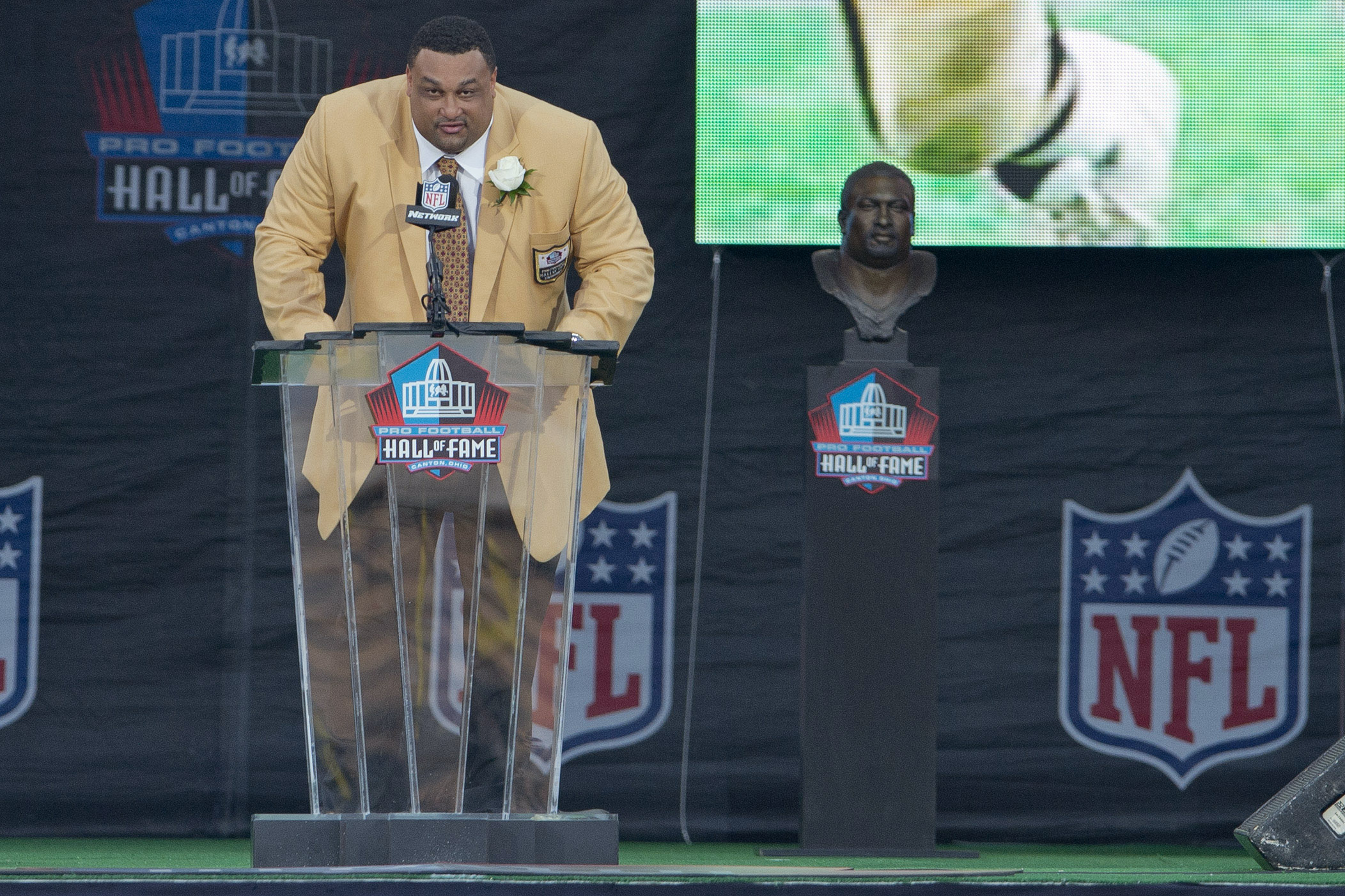 CANTON, OH - AUGUST 4: Former tackle Willie Roaf gives his speech during the Class of 2012 Pro Football Hall of Fame Enshrinement Ceremony at Fawcett Stadium on August 4, 2012 in Canton, Ohio. (Photo by Jason Miller/Getty Images)