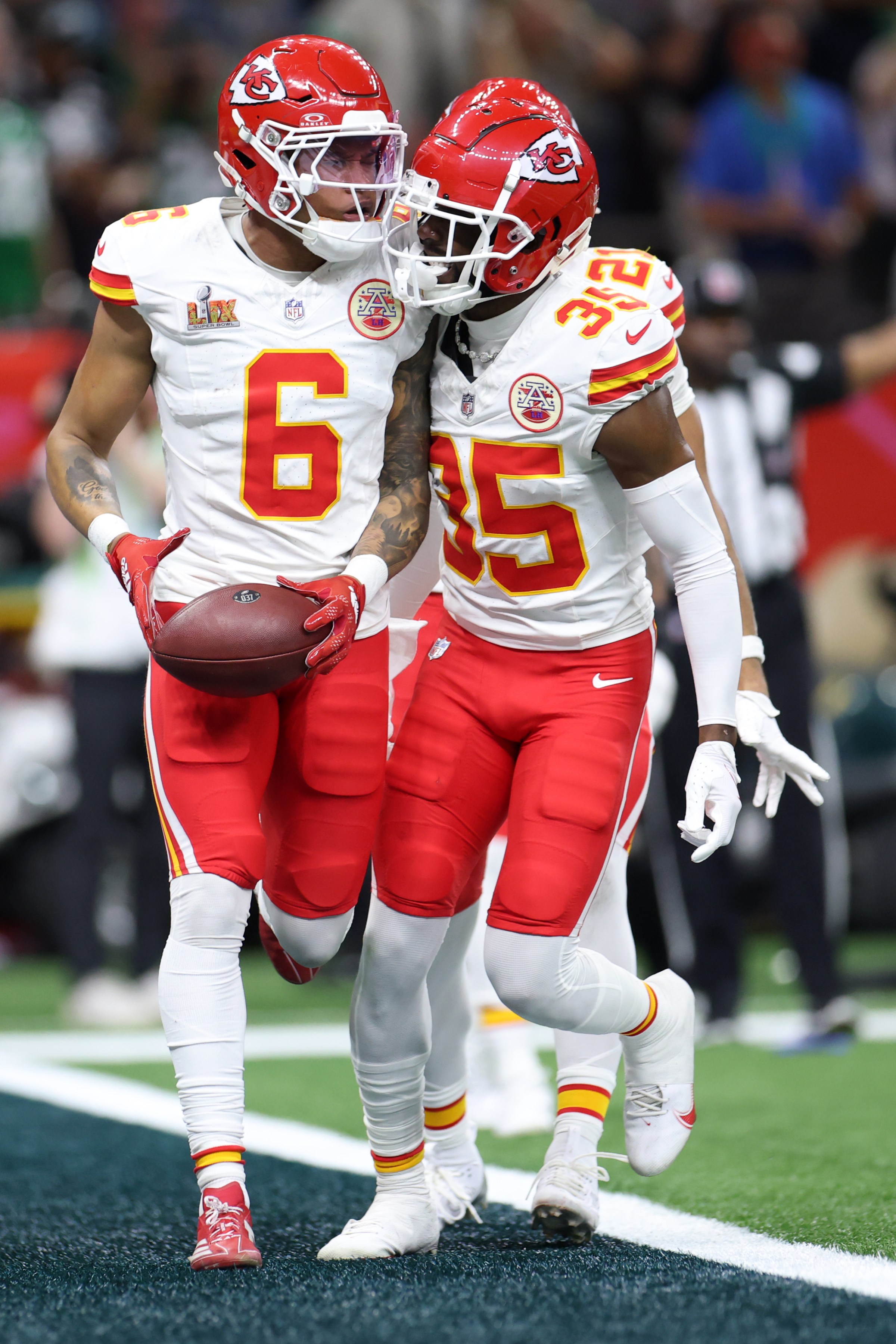 NEW ORLEANS, LOUISIANA - FEBRUARY 09: Bryan Cook #6 of the Kansas City Chiefs celebrates an interception with Jaylen Watson #35 in the second quarter against the Philadelphia Eagles during Super Bowl LIX at Caesars Superdome on February 09, 2025 in New Orleans, Louisiana. (Photo by Jamie Squire/Getty Images)
