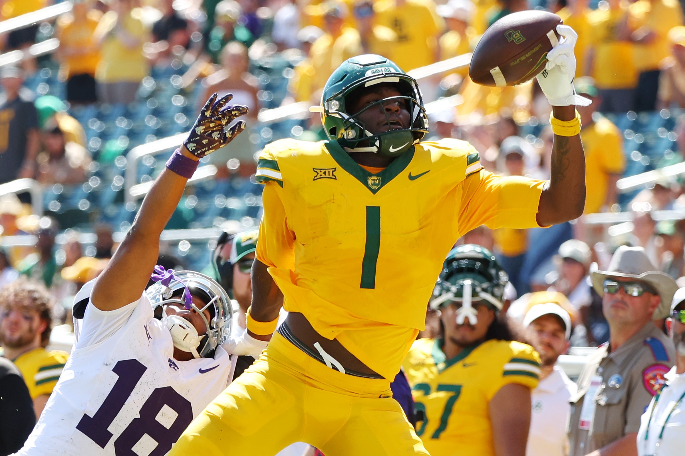 WACO, TEXAS - OCTOBER 04: Tight end Michael Trigg #1 of the Baylor Bears makes a one handed catch in the fourth quarter against safety Wesley Fair #18 of the Kansas State Wildcats at McLane Stadium on October 04, 2025 in Waco, Texas. (Photo by Richard Rodriguez/Getty Images)