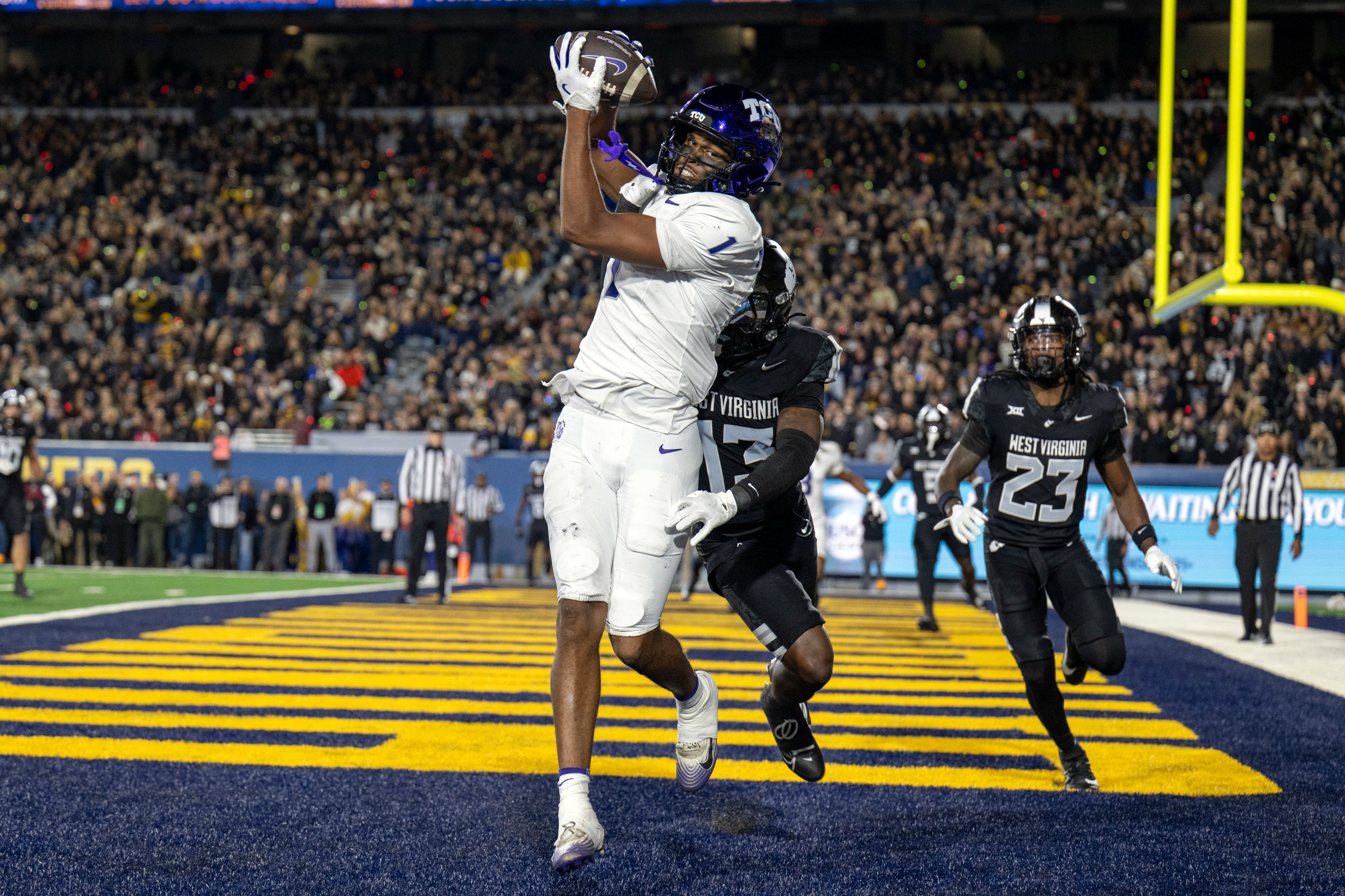 MORGANTOWN, WEST VIRGINIA - OCTOBER 25: Eric McAlister #1 of the TCU Horned Frogs catches a ball during a game against the West Virginia Mountaineers at Milan Puskar Stadium on October 25, 2025 in Morgantown, West Virginia. (Photo by Brien Aho/Getty Images)