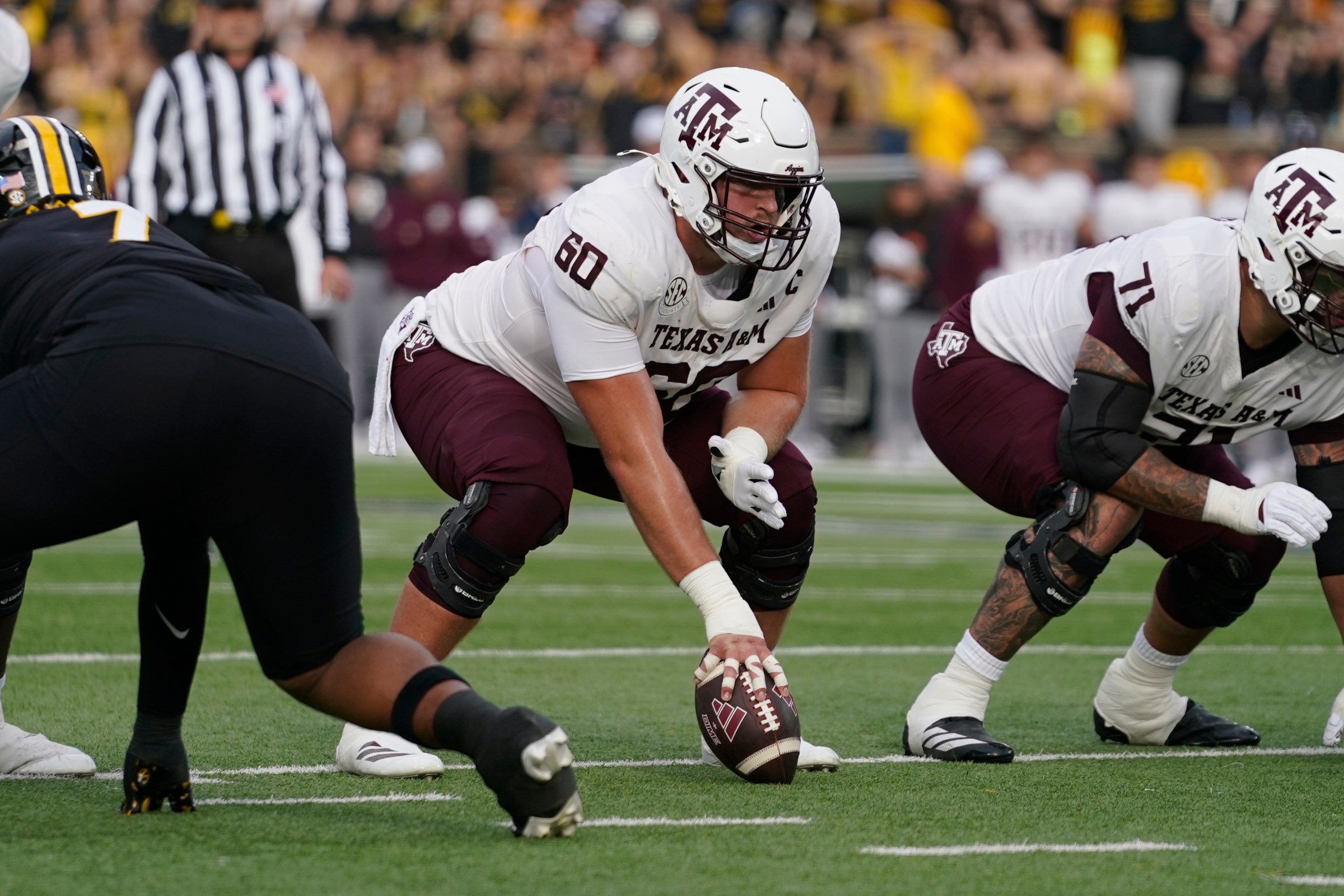 COLUMBIA, MISSOURI - NOVEMBER 08: Center Trey Zuhn III #60 of the Texas A&M Aggies is seen against the Missouri Tigers in the first half at Faurot Field at Memorial Stadium on November 08, 2025 in Columbia, Missouri. (Photo by Ed Zurga/Getty Images)