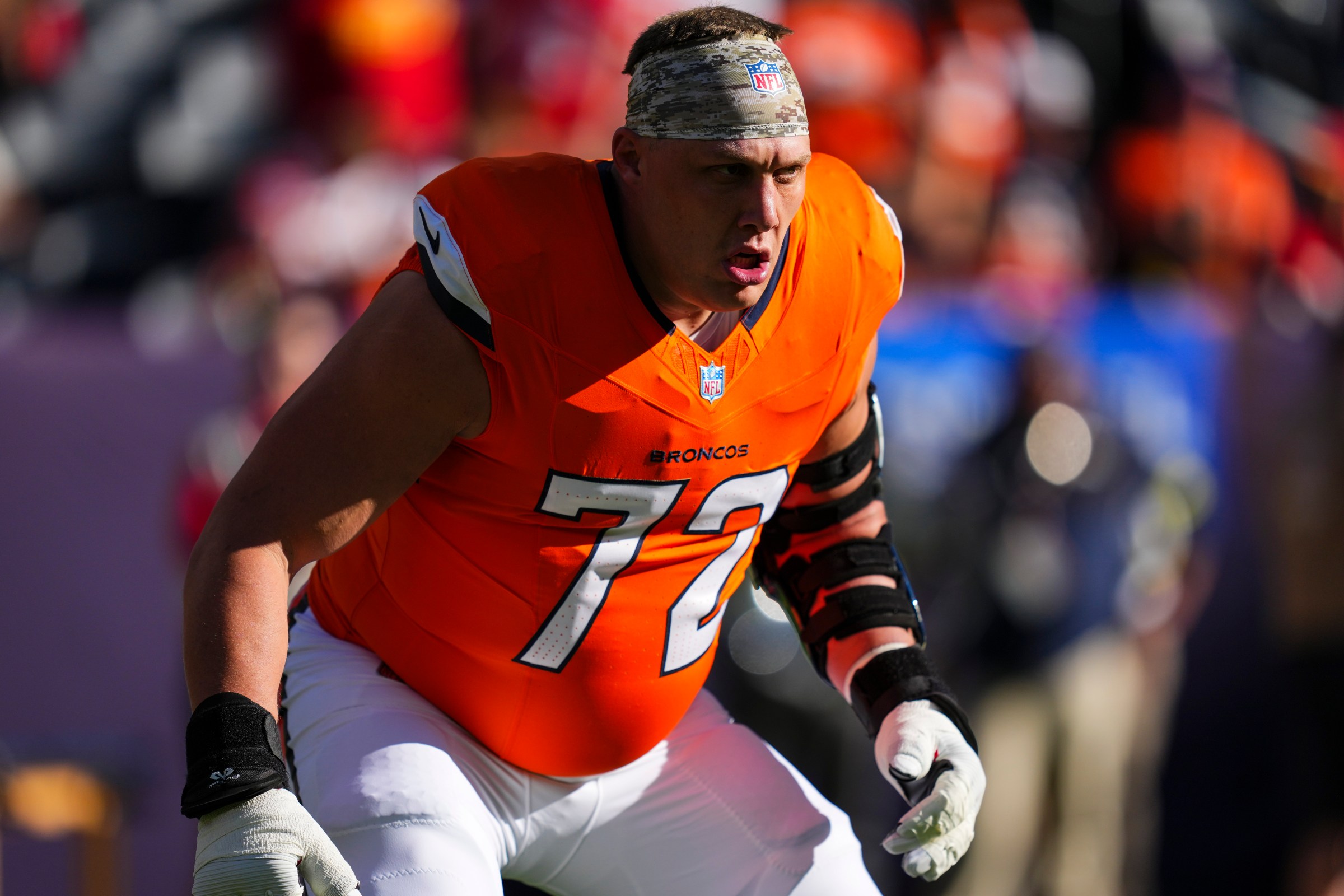 DENVER, CO - NOVEMBER 16: Garett Bolles #72 of the Denver Broncos warms up prior to an NFL football game against the Kansas City Chiefs at Empower Field at Mile High on November 16, 2025 in Denver, Colorado. (Photo by Cooper Neill/Getty Images)