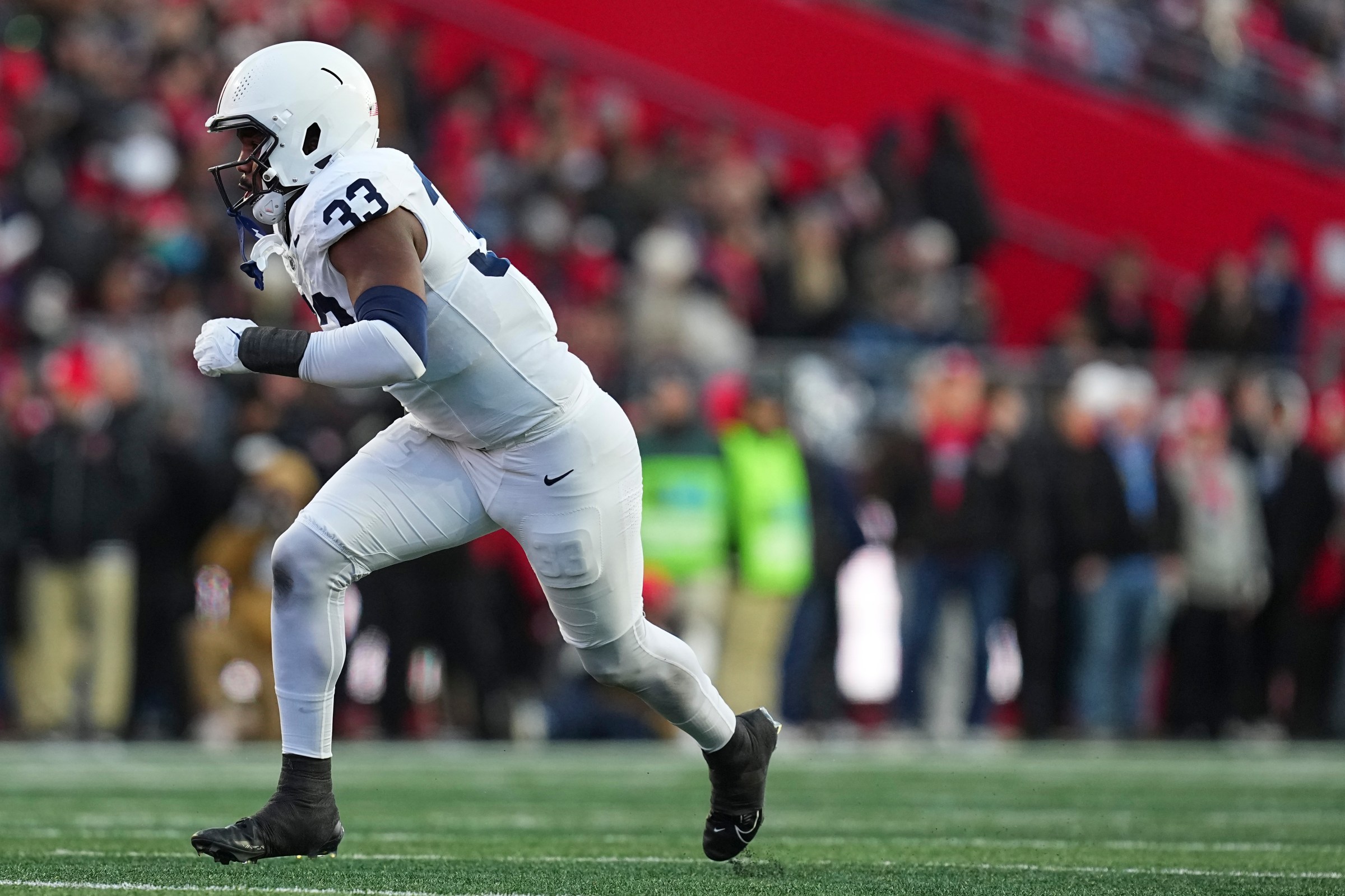 PISCATAWAY, NEW JERSEY - NOVEMBER 29: Dani Dennis-Sutton #33 of the Penn State Nittany Lions in action against the Rutgers Scarlet Knights at SHI Stadium on November 29, 2025 in Piscataway, New Jersey. The Penn State Nittany Lions defeated the Rutgers Scarlet Knights 40-36. (Photo by Mitchell Leff/Getty Images)