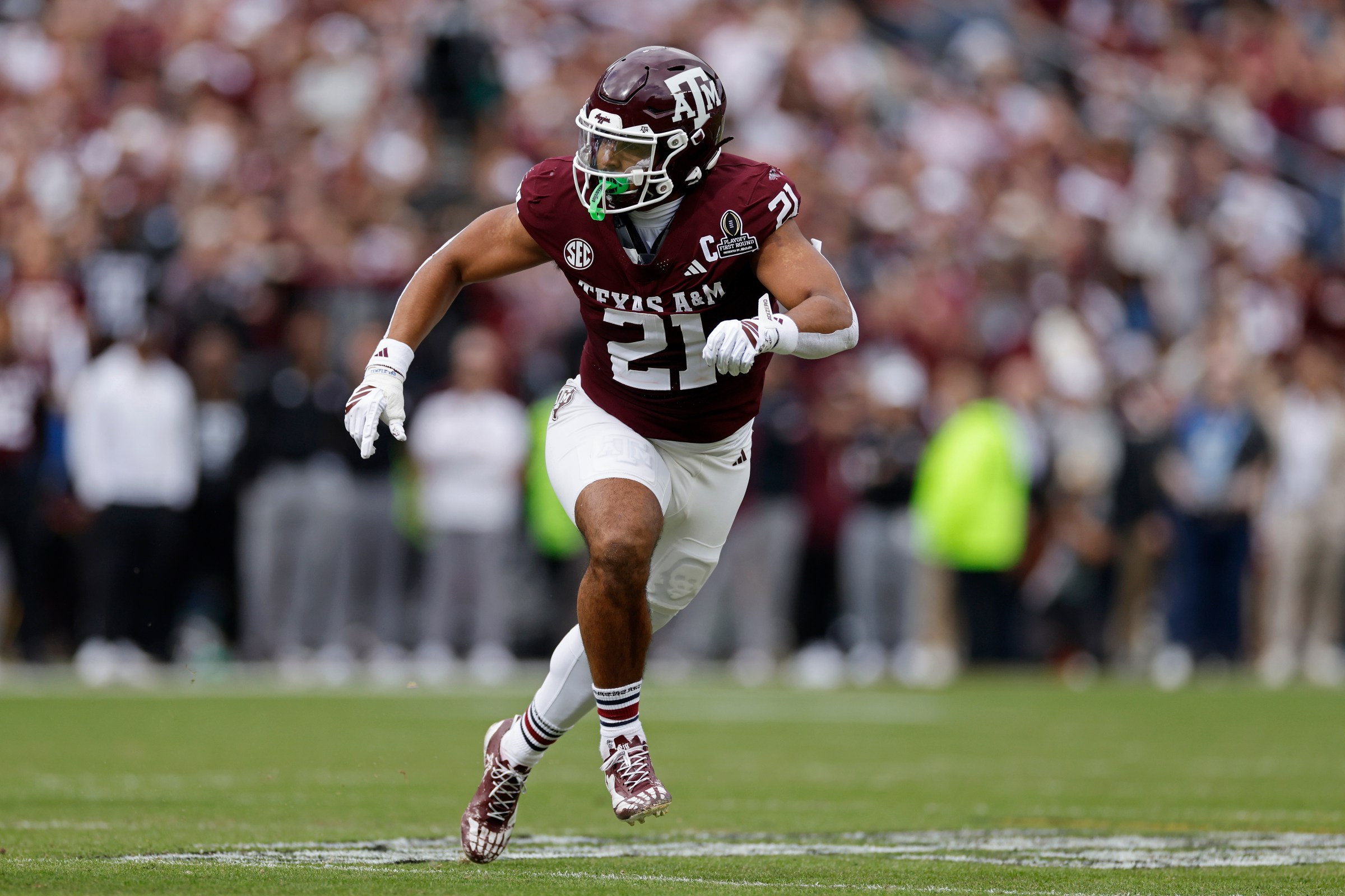 COLLEGE STATION, TX - DECEMBER 20: Taurean York #21 of the Texas A&M Aggies pursues a play on defense during the 2025 College Football Playoff First Round Game against the Miami Hurricanes on December 20, 2025 at Kyle Field in College Station, Texas. (Photo by Joe Robbins/Icon Sportswire via Getty Images)