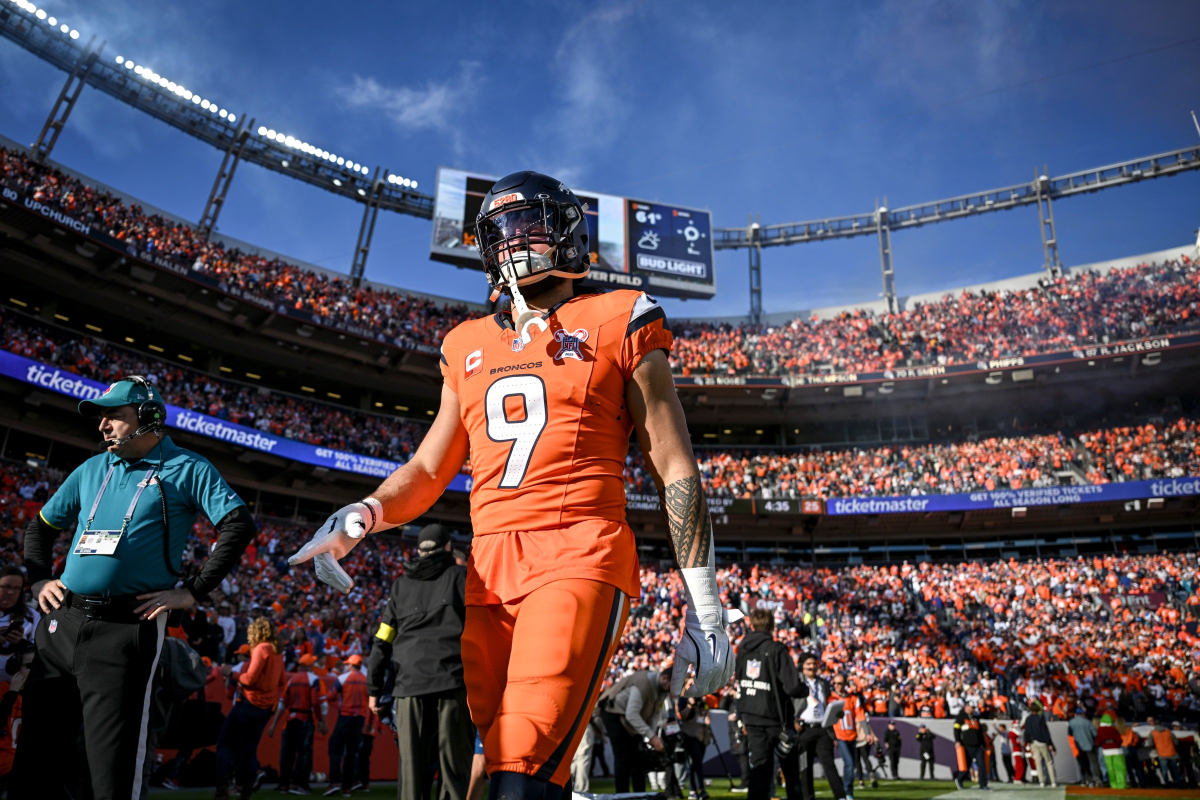 DENVER , CO - DECEMBER 21: Talanoa Hufanga (9) of the Denver Broncos walks on the field before the game against the Jacksonville Jaguars at Empower Field at Mile High in Denver, Colorado on Sunday, December 21, 2025. (Photo by AAron Ontiveroz/MediaNews Group/The Denver Post via Getty Images)