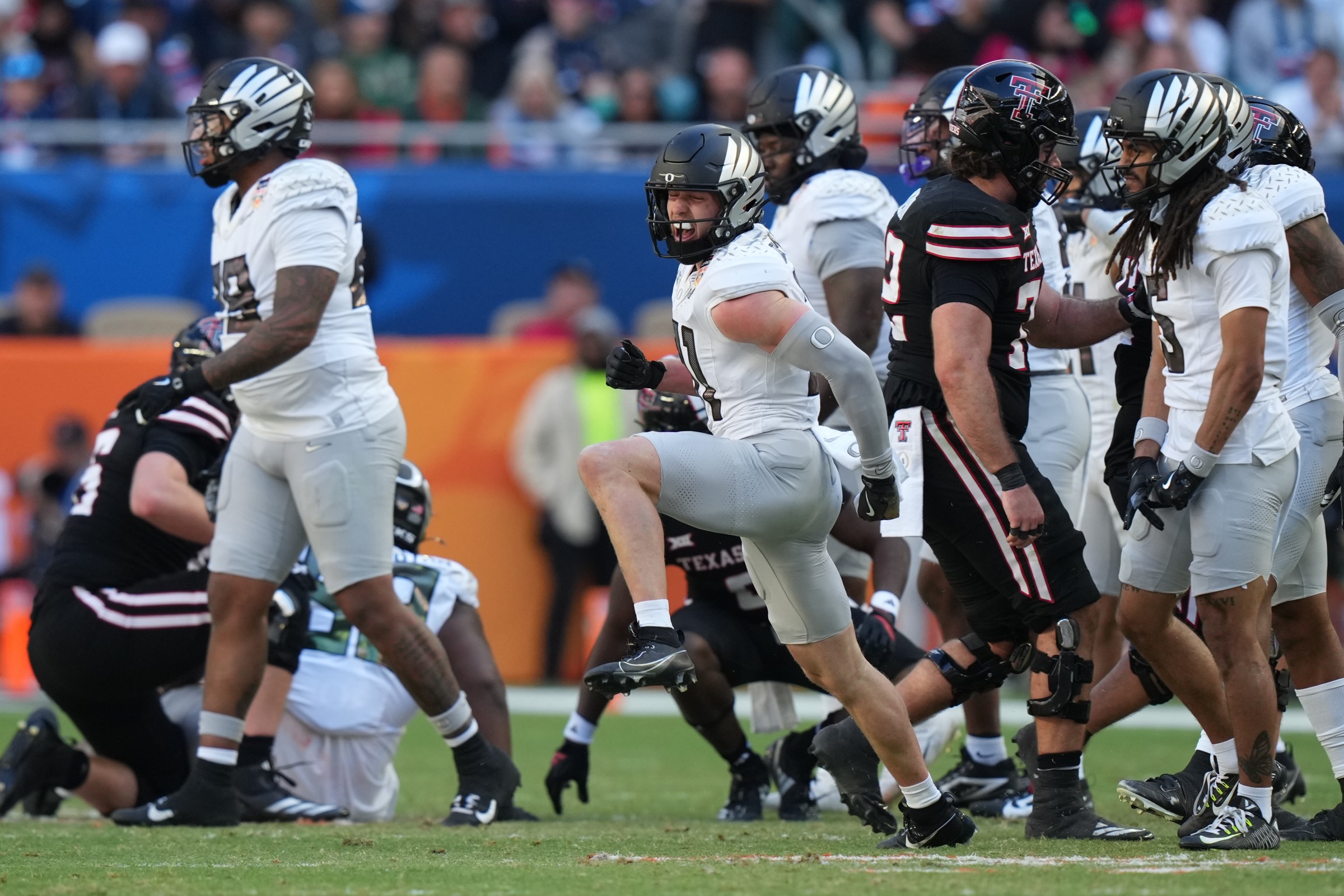 MIAMI GARDENS, FL - JANUARY 01: Oregon Ducks defensive back Dillon Thieneman (31) celebrates after a defensive stop during the college football playoffs at the Orange Bowl between the Oregon Ducks and the Texas Tech Red Raiders on Thursday, January 1, 2026 at Hard Rcok Stadium in Miami Gardens, FL. Photo by Peter Joneleit/Icon Sportswire via Getty Images)