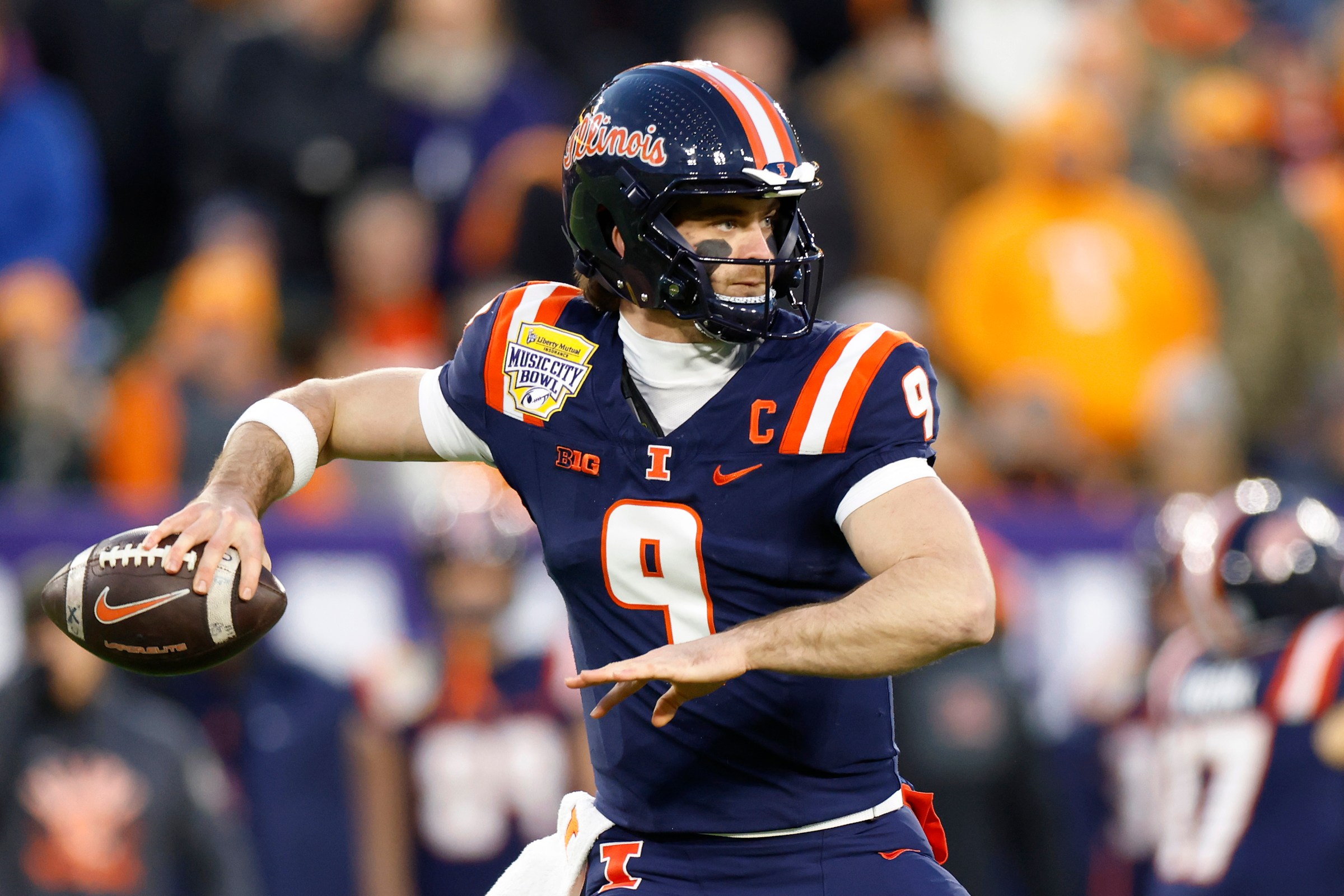 NASHVILLE, TENNESSEE - DECEMBER 30: Luke Altmyer #9 of the Illinois Fighting Illini passes during the first quarter of the Music City Bowl against the Tennessee Volunteers at Nissan Stadium on December 30, 2025 in Nashville, Tennessee. (Photo by Johnnie Izquierdo/Getty Images)