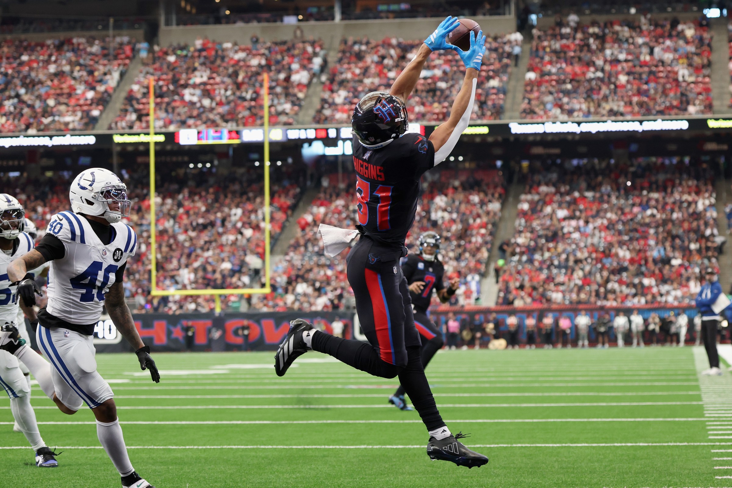 HOUSTON, TEXAS - JANUARY 04: Jayden Higgins #81 of the Houston Texans catches a pass for a touchdown during the second quarter of the game against the Indianapolis Colts at NRG Stadium on January 04, 2026 in Houston, Texas. (Photo by Tim Warner/Getty Images)