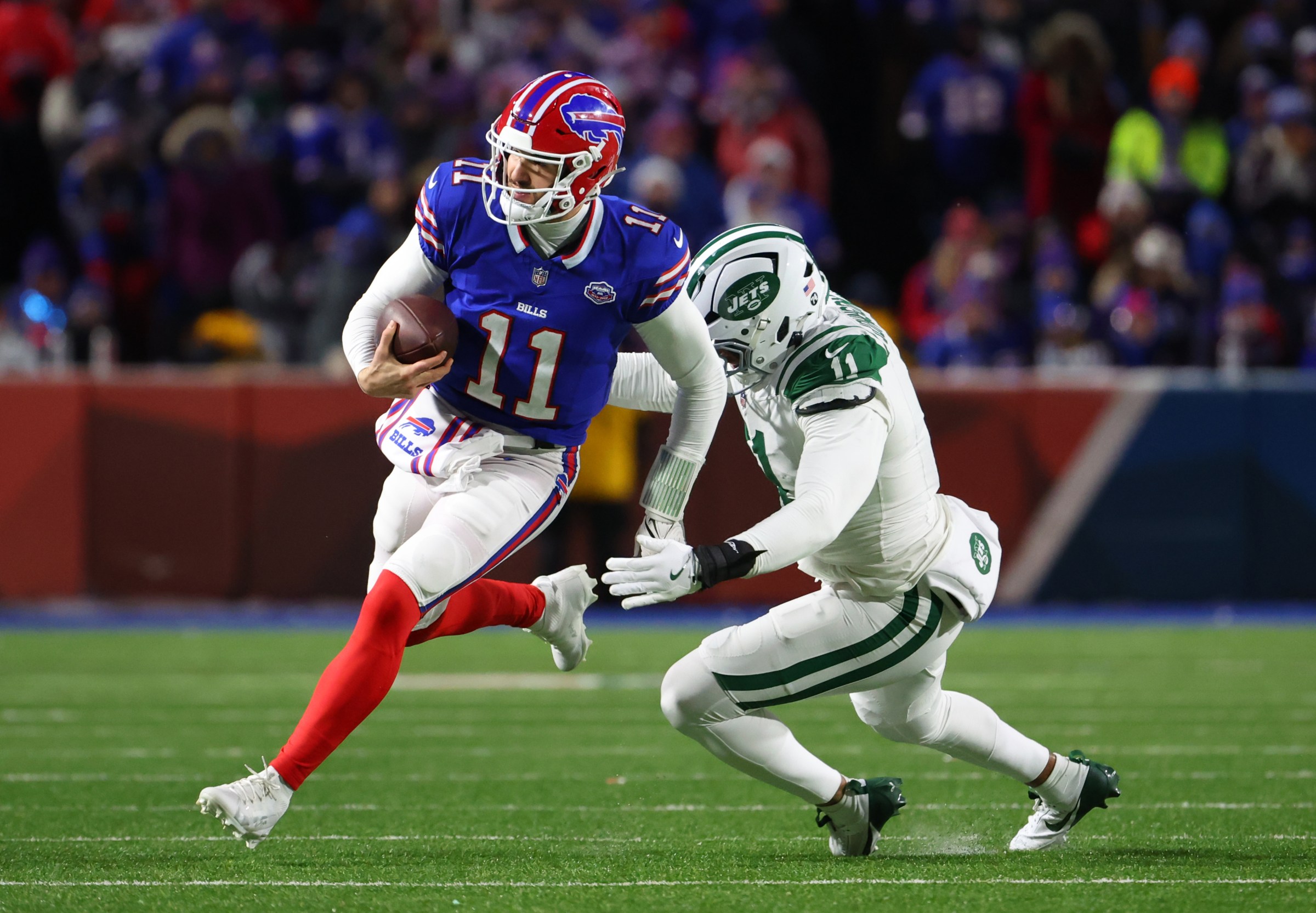 ORCHARD PARK, NEW YORK - JANUARY 4: Mitchell Trubisky #11 of the Buffalo Bills runs the ball against the New York Jets at Highmark Stadium on January 4, 2026 in Orchard Park, New York. (Photo by Timothy T Ludwig/Getty Images)