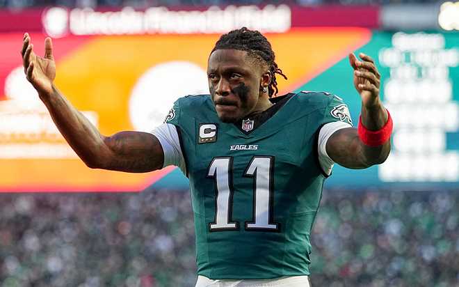 NFC Wild Card Playoffs: San Francisco 49ers v Philadelphia Eagles PHILADELPHIA, PENNSYLVANIA - JANUARY 11: A.J. Brown #11 of the Philadelphia Eagles pumps up the crowd before the NFC Wild Card Playoff game against the San Francisco 49ers at Lincoln Financial Field on January 11, 2026 in Philadelphia, Pennsylvania. (Photo by Mitchell Leff/Getty Images)