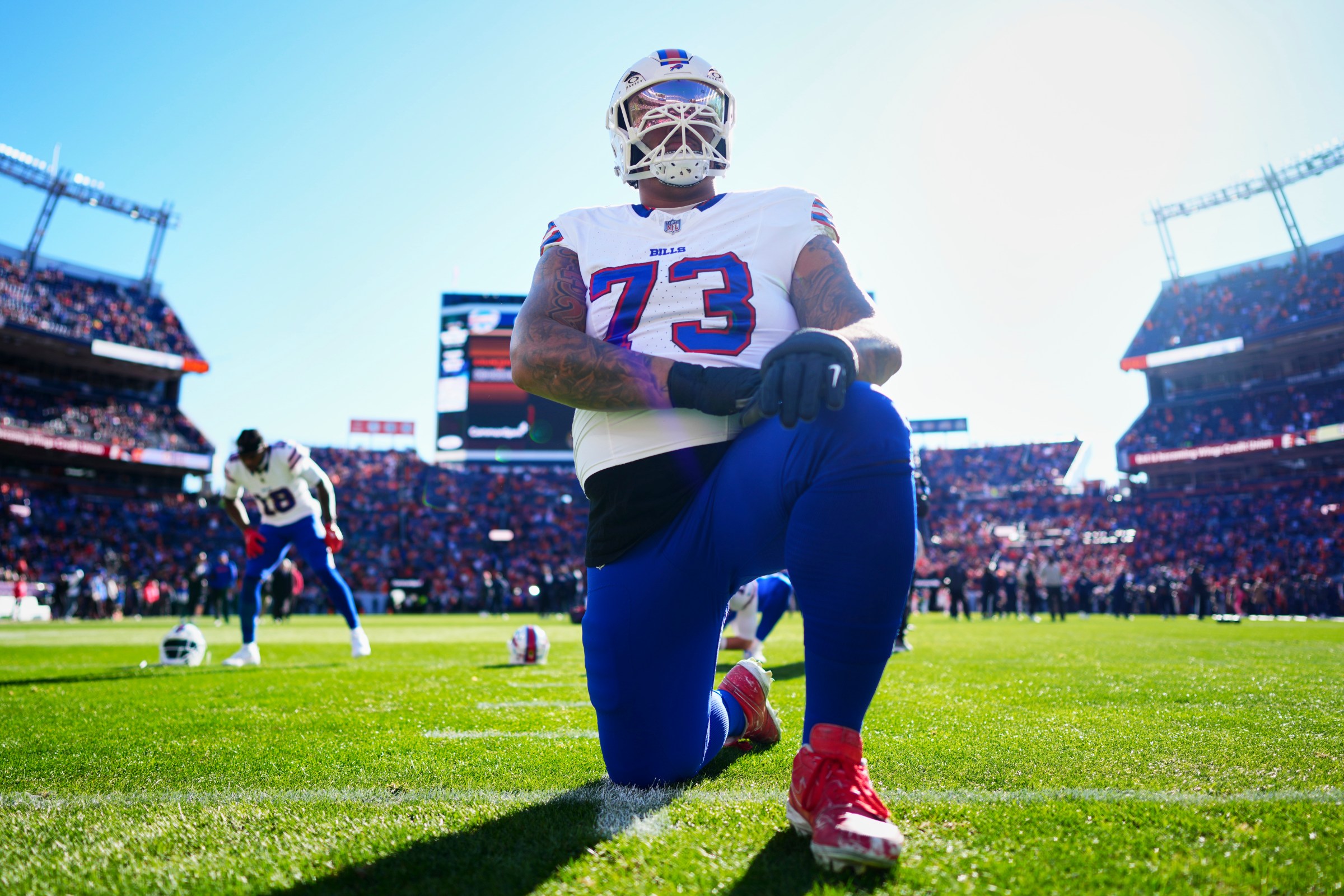 DENVER, CO - JANUARY 17: Dion Dawkins #73 of the Buffalo Bills warms up before kickoff against the Denver Broncos in the AFC Divisional Playoff game at Empower Field At Mile High on January 17, 2026 in Denver, Colorado. (Photo by Cooper Neill/Getty Images)