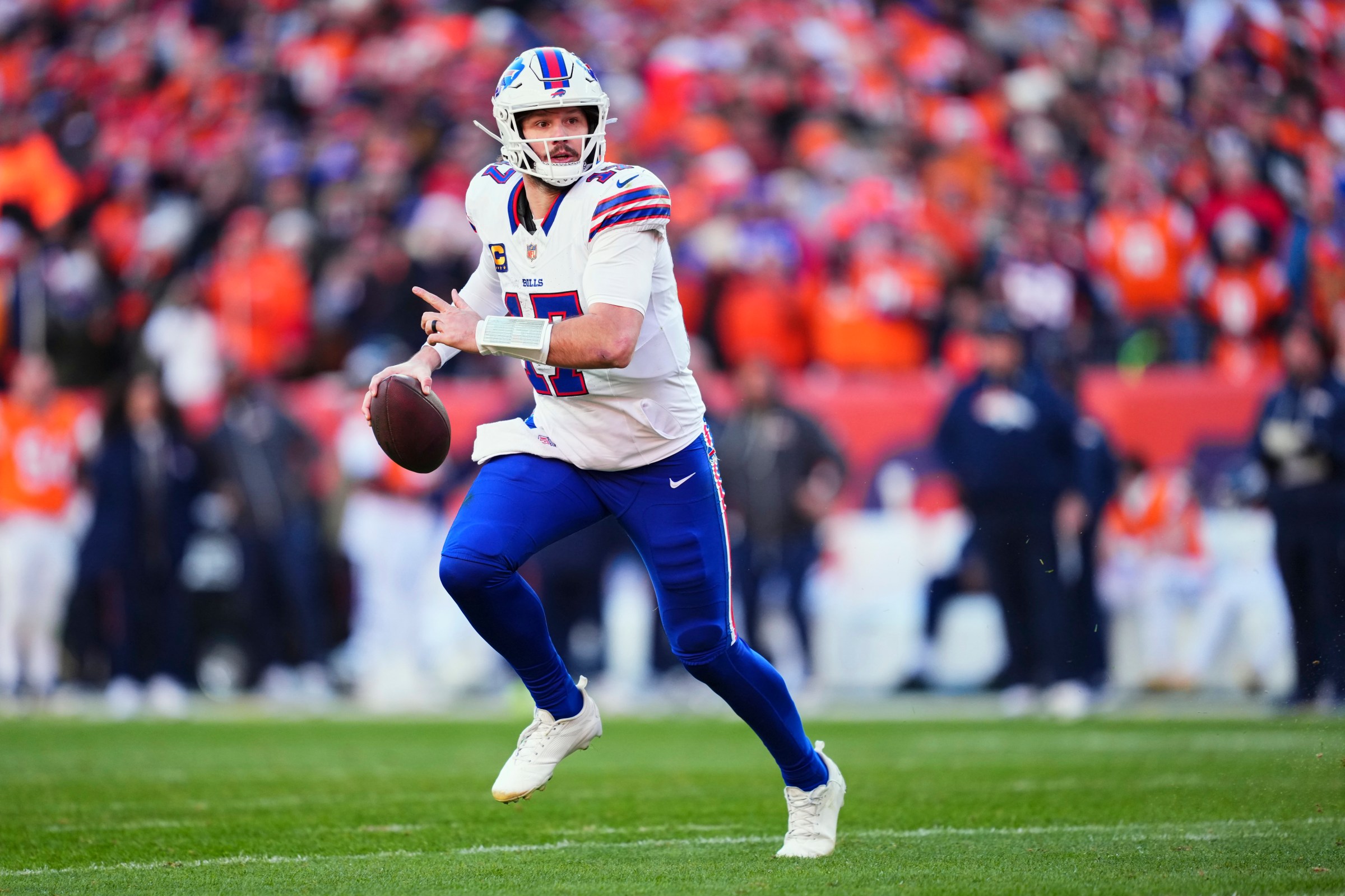 DENVER, CO - JANUARY 17: Josh Allen #17 of the Buffalo Bills drops back to pass against the Denver Broncos during the first half of an AFC Divisional Playoff game at Empower Field At Mile High on January 17, 2026 in Denver, Colorado. (Photo by Cooper Neill/Getty Images)