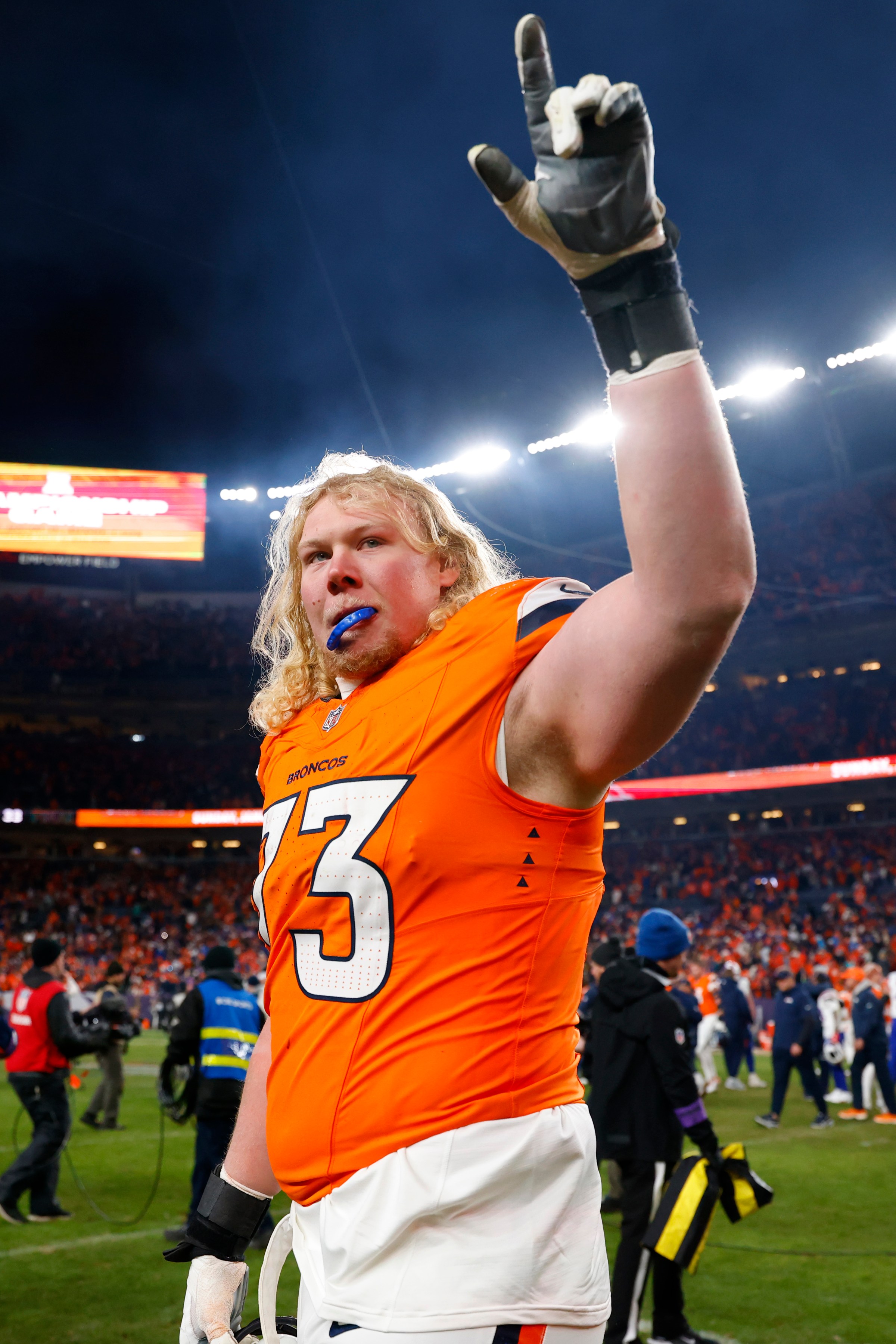 DENVER, COLORADO - JANUARY 17: Frank Crum #73 of the Denver Broncos celebrates after defeating the Buffalo Bills with a score of 30 to 33 in overtime of the AFC Divisional Playoff game at Empower Field At Mile High on January 17, 2026 in Denver, Colorado. (Photo by Justin Edmonds/Getty Images)