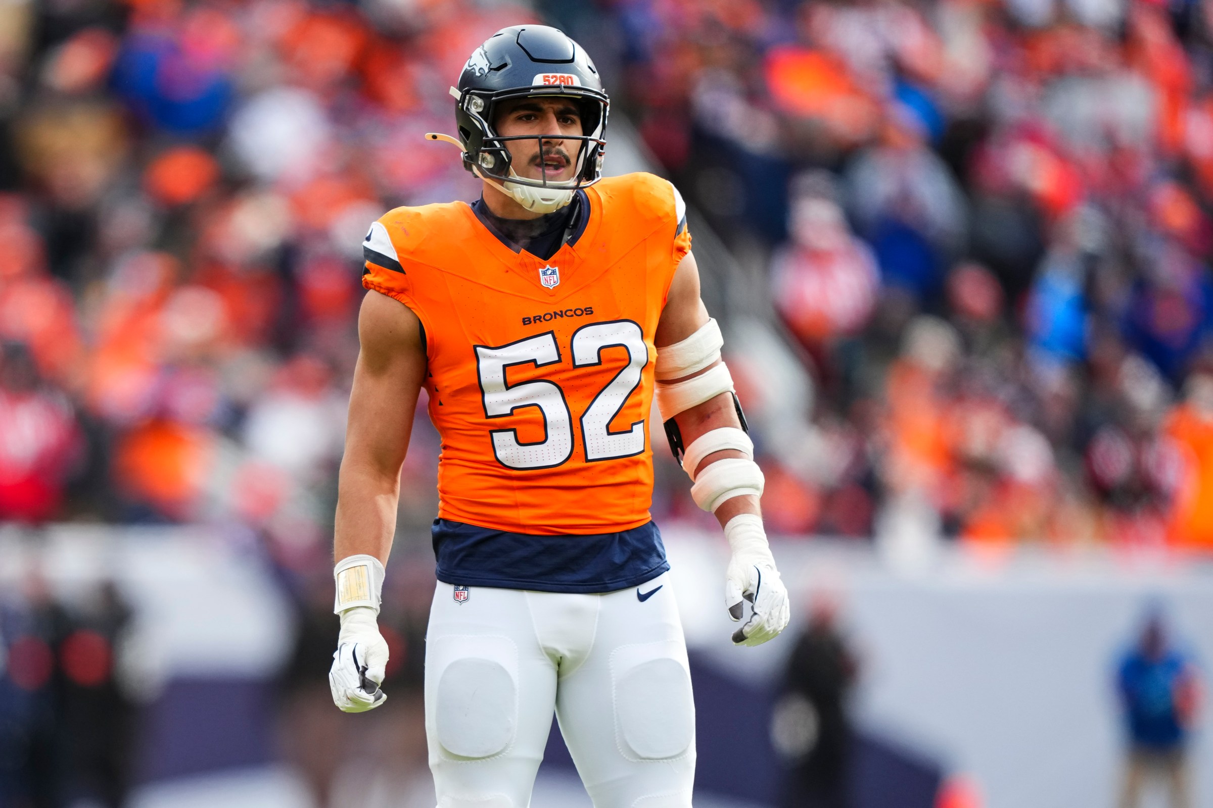DENVER, CO - JANUARY 25: Jonah Elliss #52 of the Denver Broncos looks on from the field during the AFC Championship NFL football game against the New England Patriots at Empower Field At Mile High on January 25, 2026 in Denver, Colorado. (Photo by Cooper Neill/Getty Images)