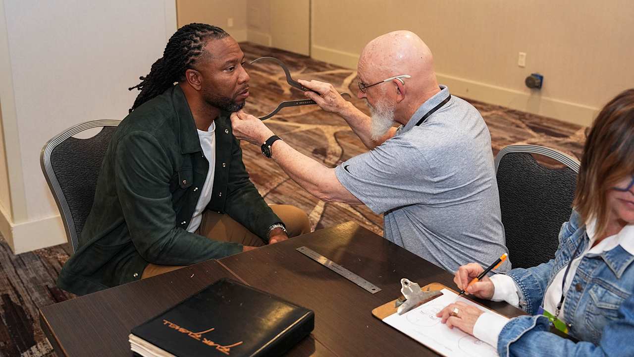 Cardinals wide receiver Larry Fitzgerald gets sized for Hall of Fame jacket, bust, and ring