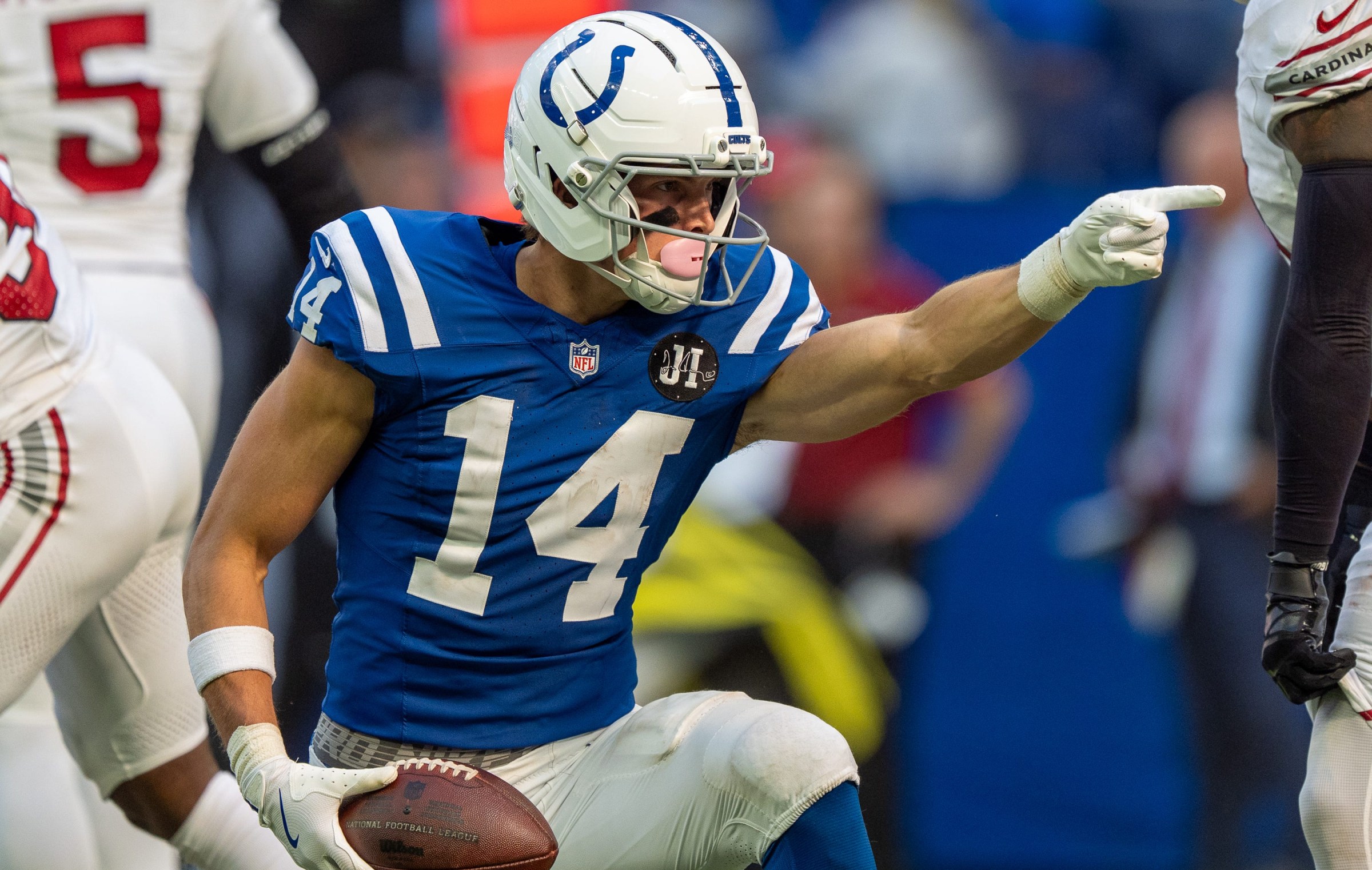 Indianapolis Colts wide receiver Alec Pierce (14) signals a first down after a catch Sunday, Oct. 12, 2025, against the Arizona Cardinals at Lucas Oil Stadium in Indianapolis.
