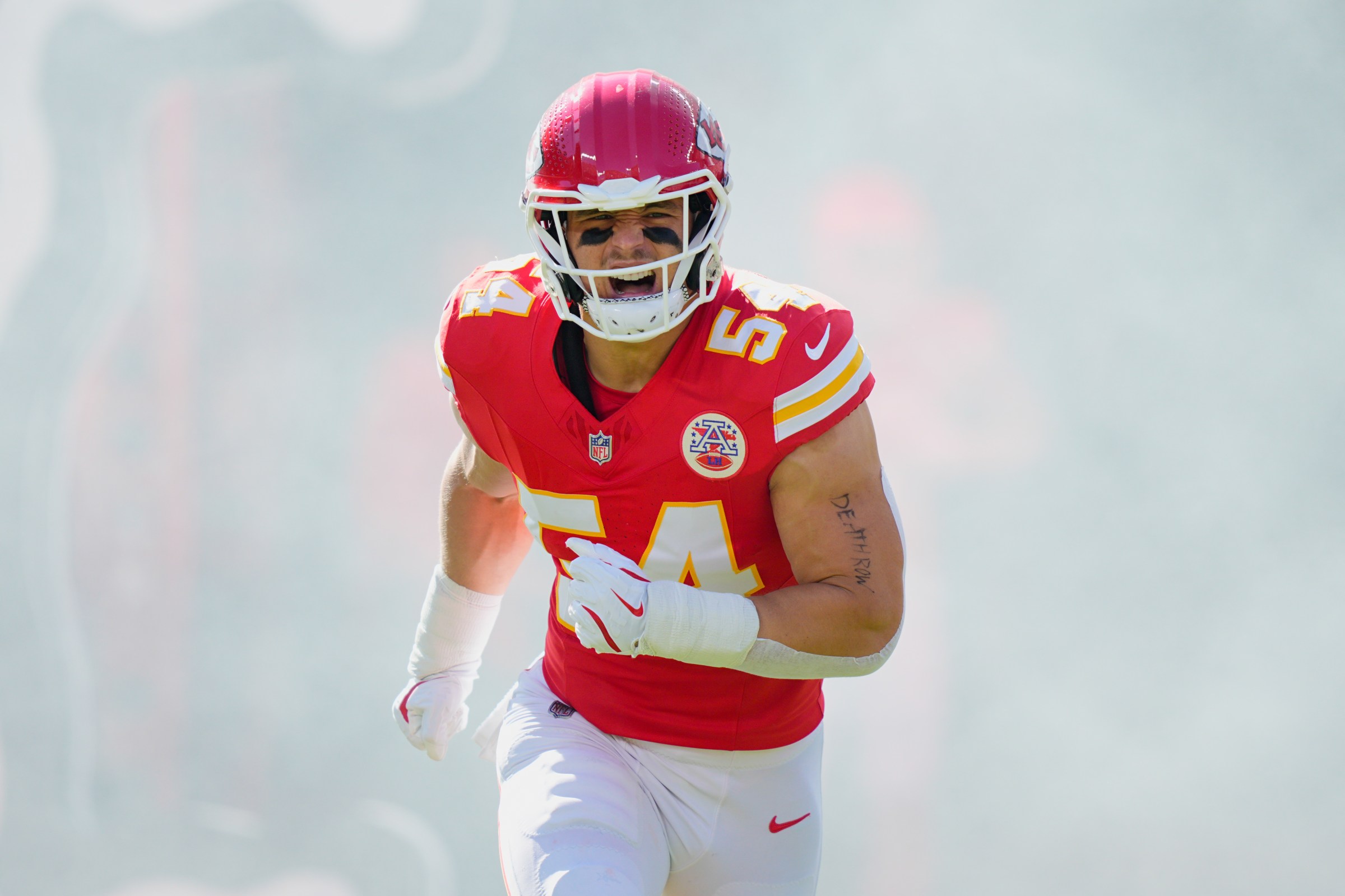 Oct 19, 2025; Kansas City, Missouri, USA; Kansas City Chiefs linebacker Leo Chenal (54) runs onto the field during player introductions prior to the game against the Las Vegas Raiders at GEHA Field at Arrowhead Stadium. Mandatory Credit: Jay Biggerstaff-Imagn Images
