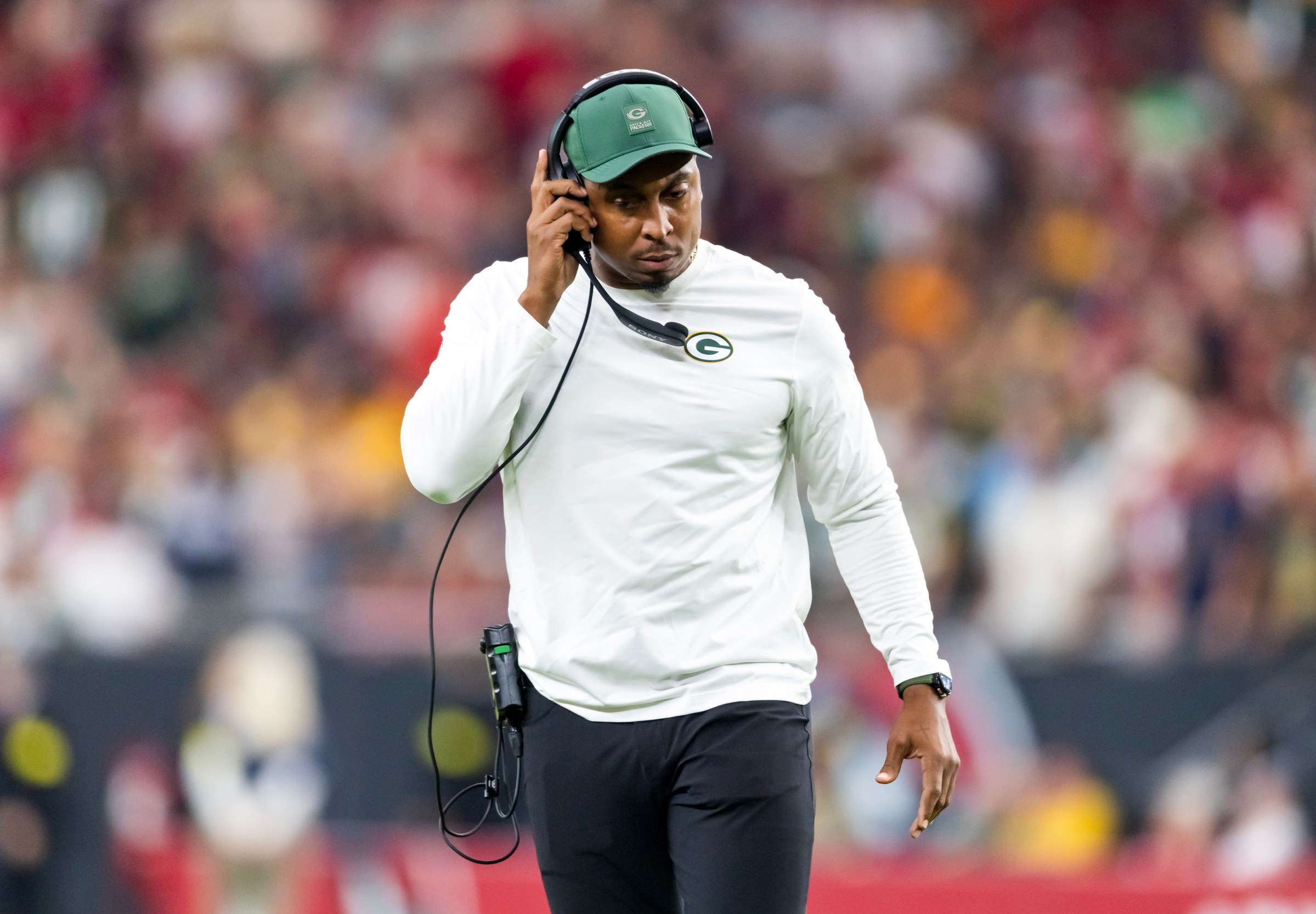 Oct 19, 2025; Glendale, Arizona, USA; Green Bay Packers defensive line coach DeMarcus Covington against the Arizona Cardinals at State Farm Stadium. Mandatory Credit: Mark J. Rebilas-Imagn Images
