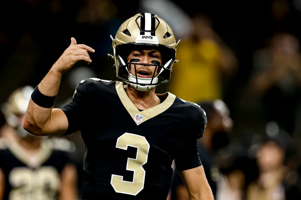 Jake Haener #3 of the New Orleans Saints warms up before a preseason game against the Jacksonville Jaguars at the Caesars Superdome