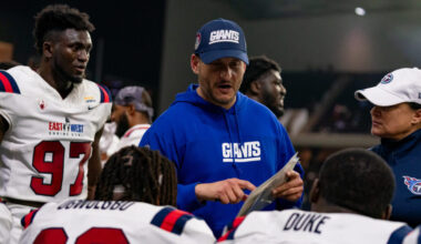 East Team special teams coordinator Michael Ghobrial speaks with his team during the East-West Shri...