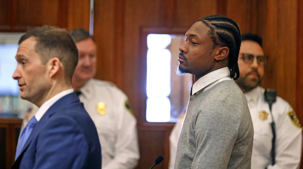 New England Patriots wide receiver Stefon Diggs leaves Norfolk County District Court after his arraignment on felony strangulation and a misdemeanor assault charges, Friday, Feb. 13, 2026, in Dedham, Mass. 