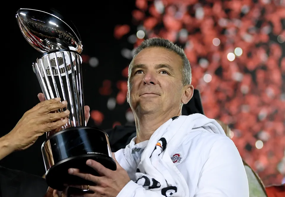 Ohio State Buckeyes head coach Urban Meyer with the Rose Bowl trophy celebrates winning the Rose Bowl in January 1, 2019