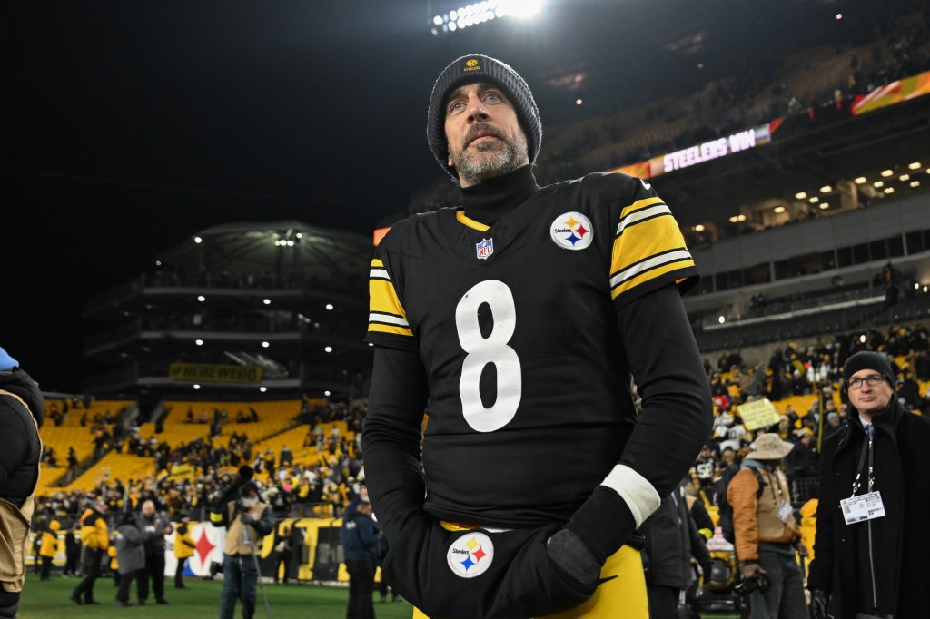 Pittsburgh Steelers quarterback Aaron Rodgers on the field after a game.