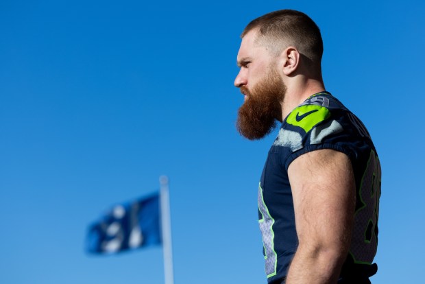 Seattle Seahawks tight end Nick Kallerup walks onto the field during practice at the team's facilities ahead of the NFL football NFC Championship game against the Los Angeles Rams, Friday, Jan. 23, 2026, in Renton, Wash. (AP Photo/Maddy Grassy)