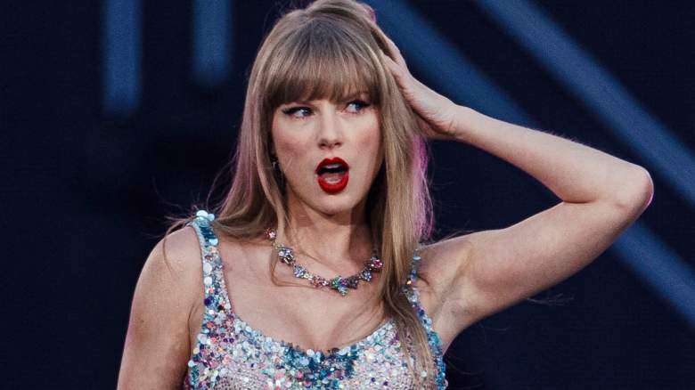 Taylor Swift performs onstage as her single “Opalite” reaches No. 1 on the Billboard Hot 100.