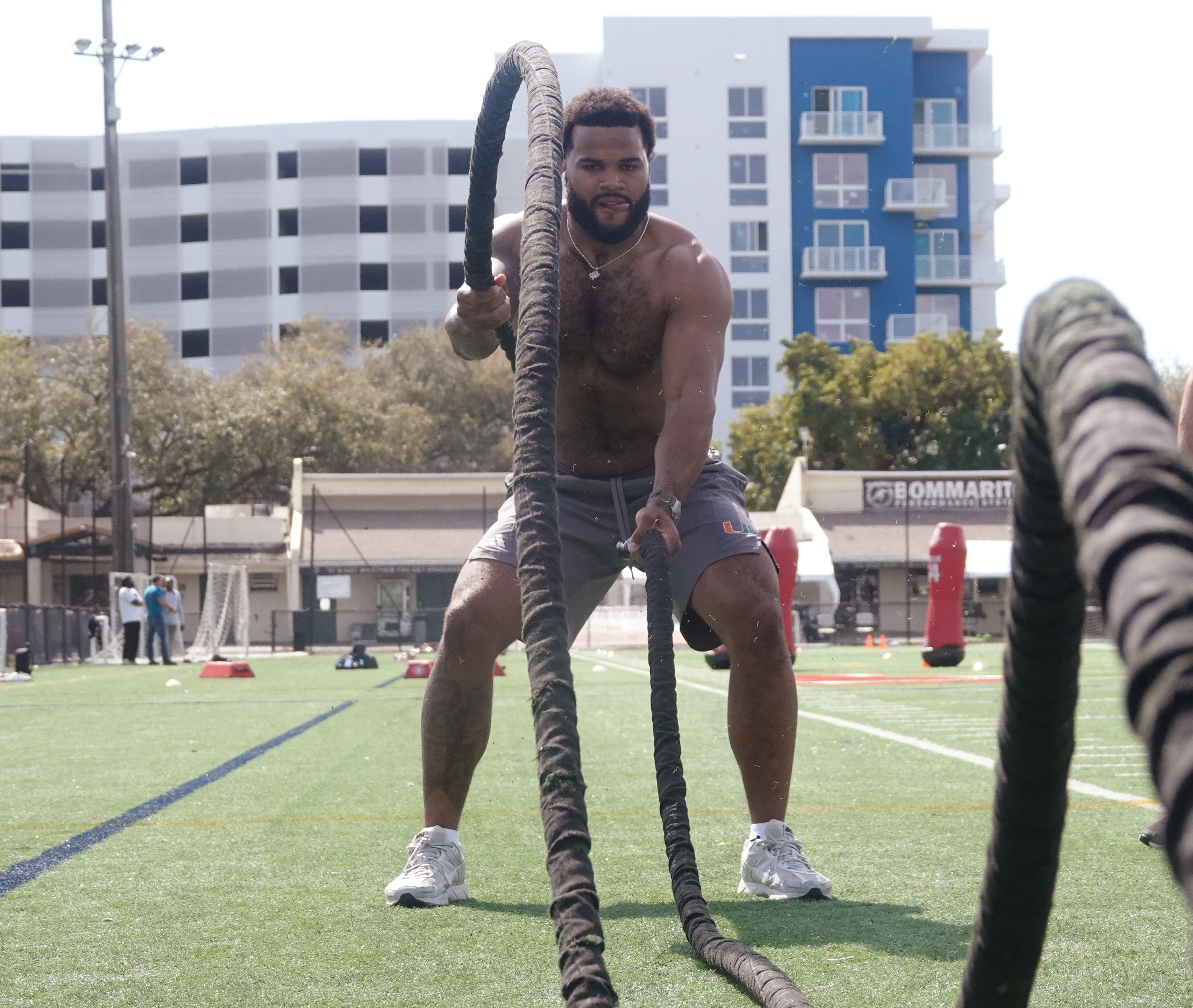 University of Miami defensive end Akheem Mesidor works out at...