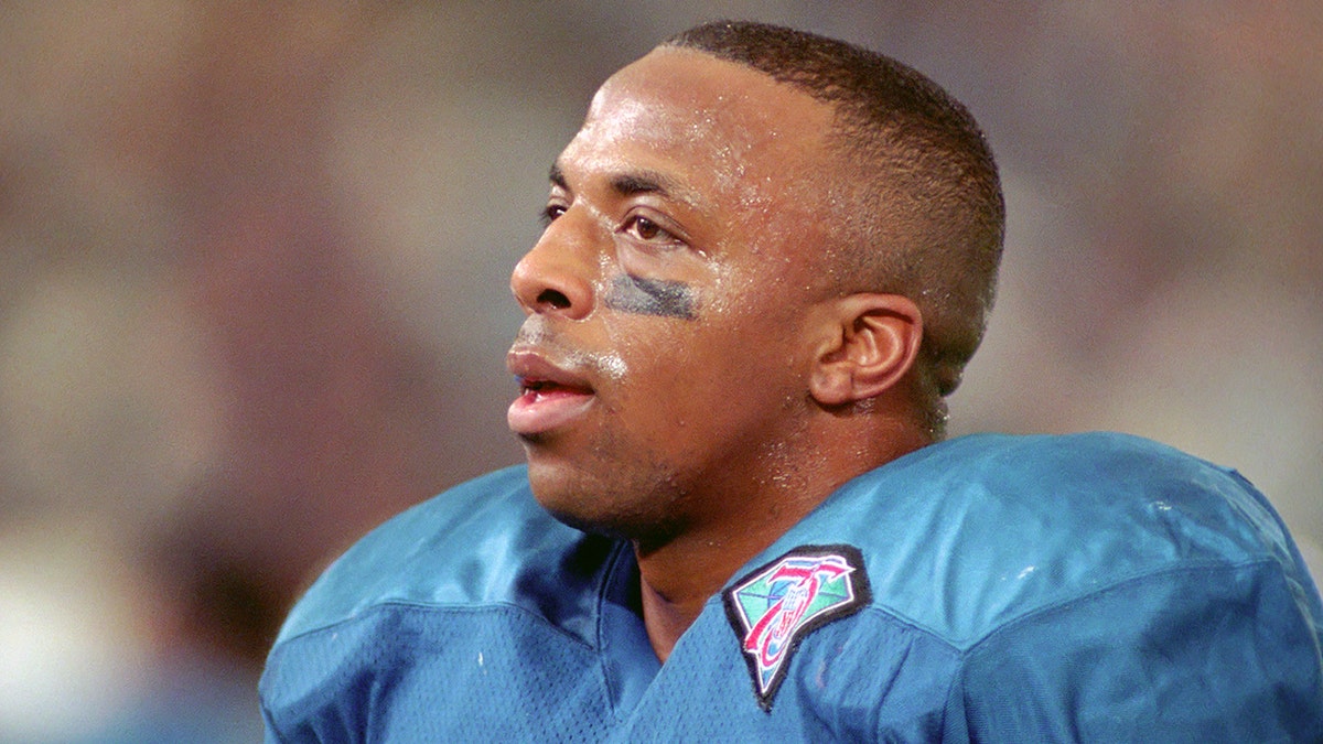 Tracy Scroggins looks on