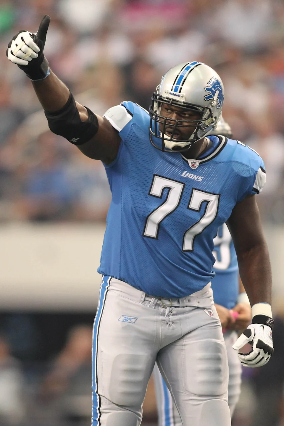 Detroit Lions tackle Gosder Cherlius reacts during the game against the Dallas Cowboys at Cowboys Stadium.