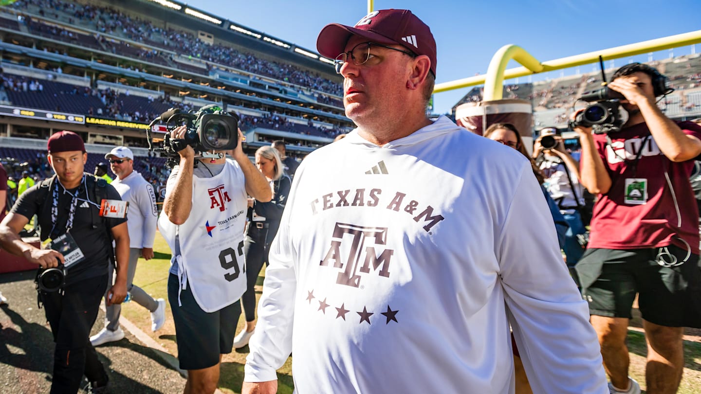 Nov 22, 2025; College Station, Texas, USA; Texas A&M Aggies head coach Mike Elko walks off the field after defeating the Samford Bulldogs 48-0 in a game at Kyle Field. Mandatory Credit: Joseph Buvid-Imagn Images